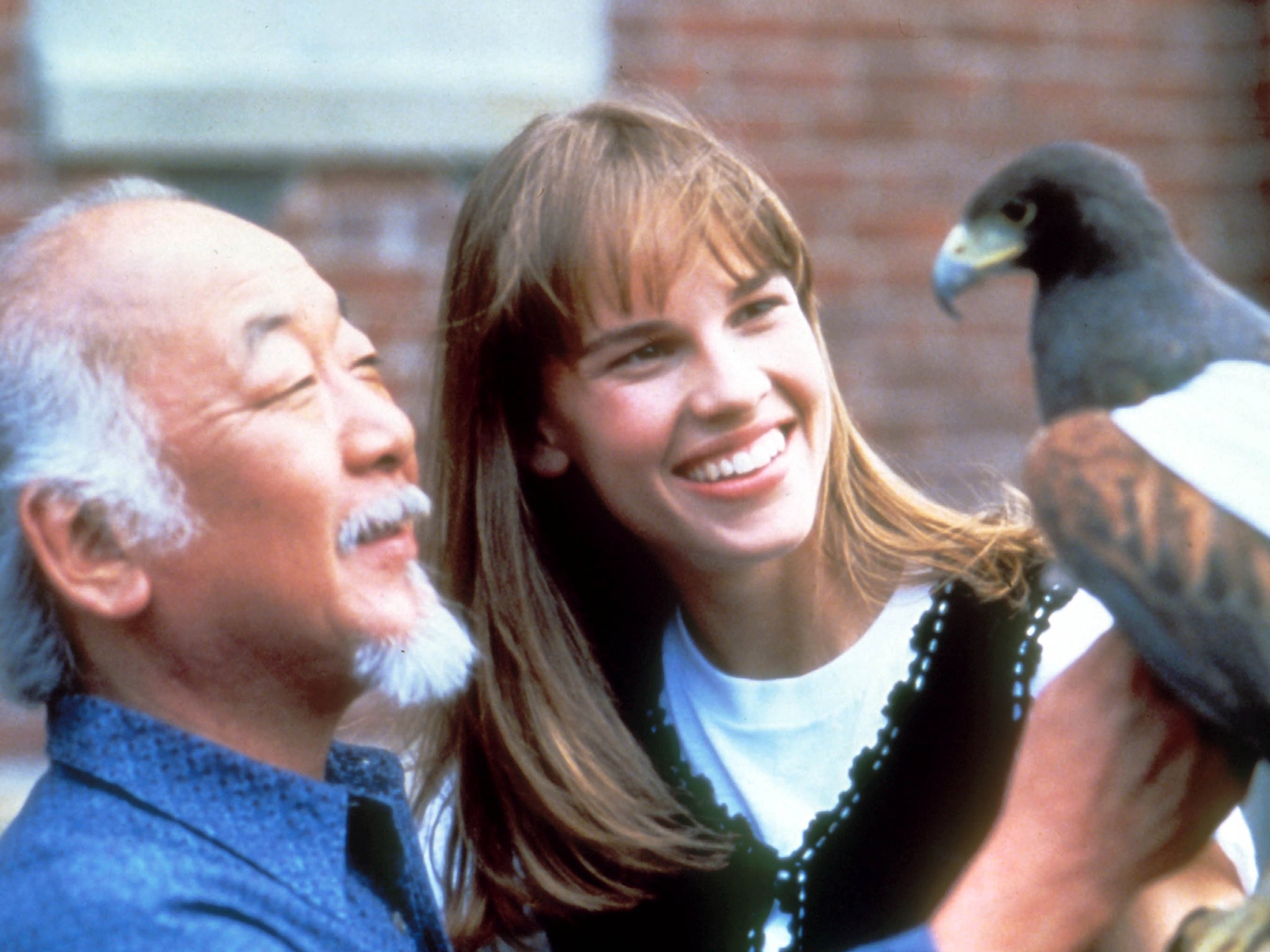 Hilary Swank and Pat Morita in The Next Karate Kid