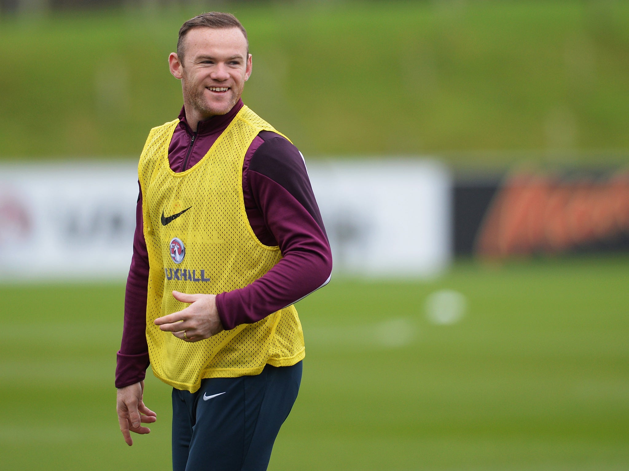 Wayne Rooney looks on during an England training session