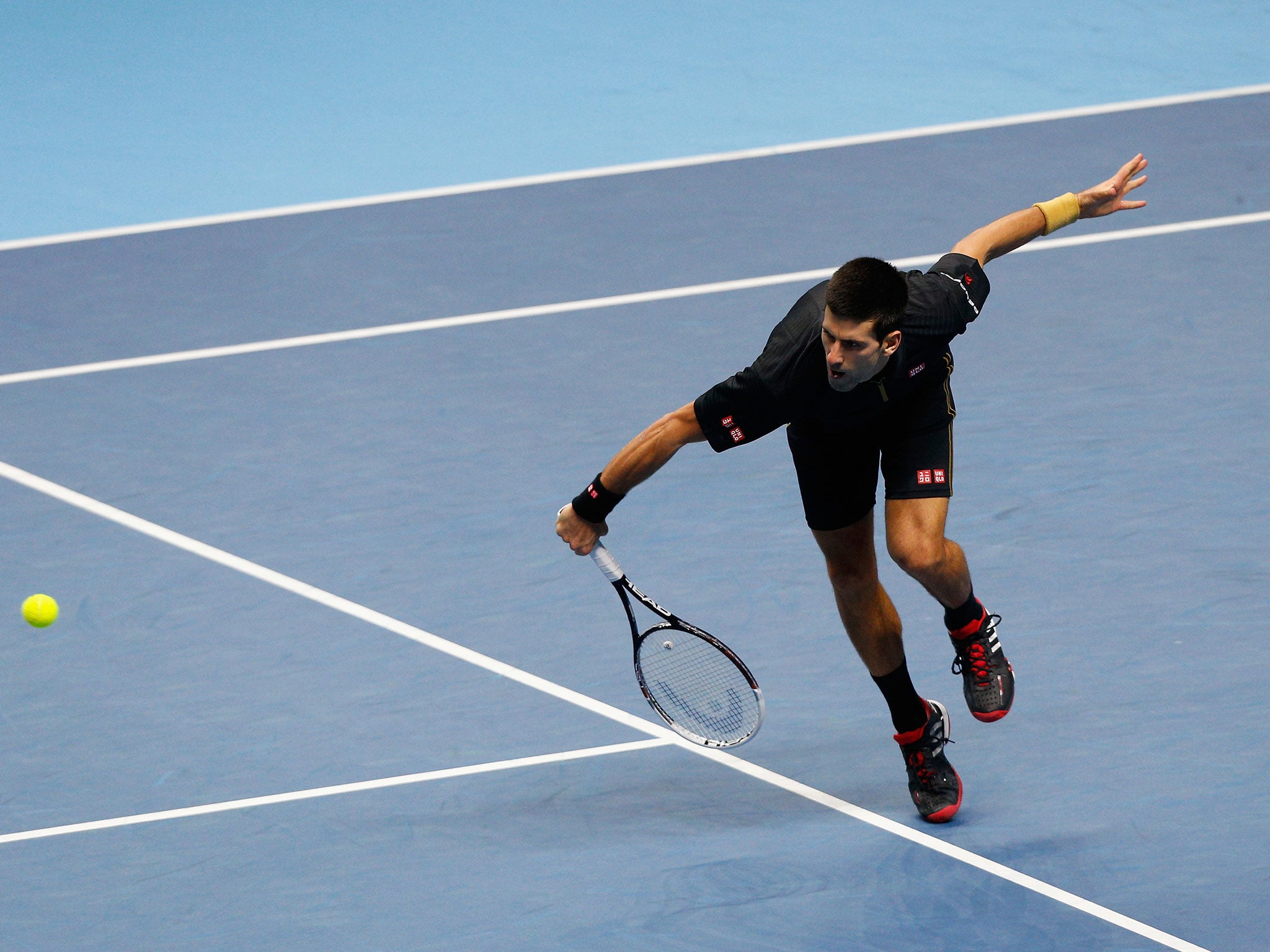 Djokovic in action against Nishikori at the O2 Arena