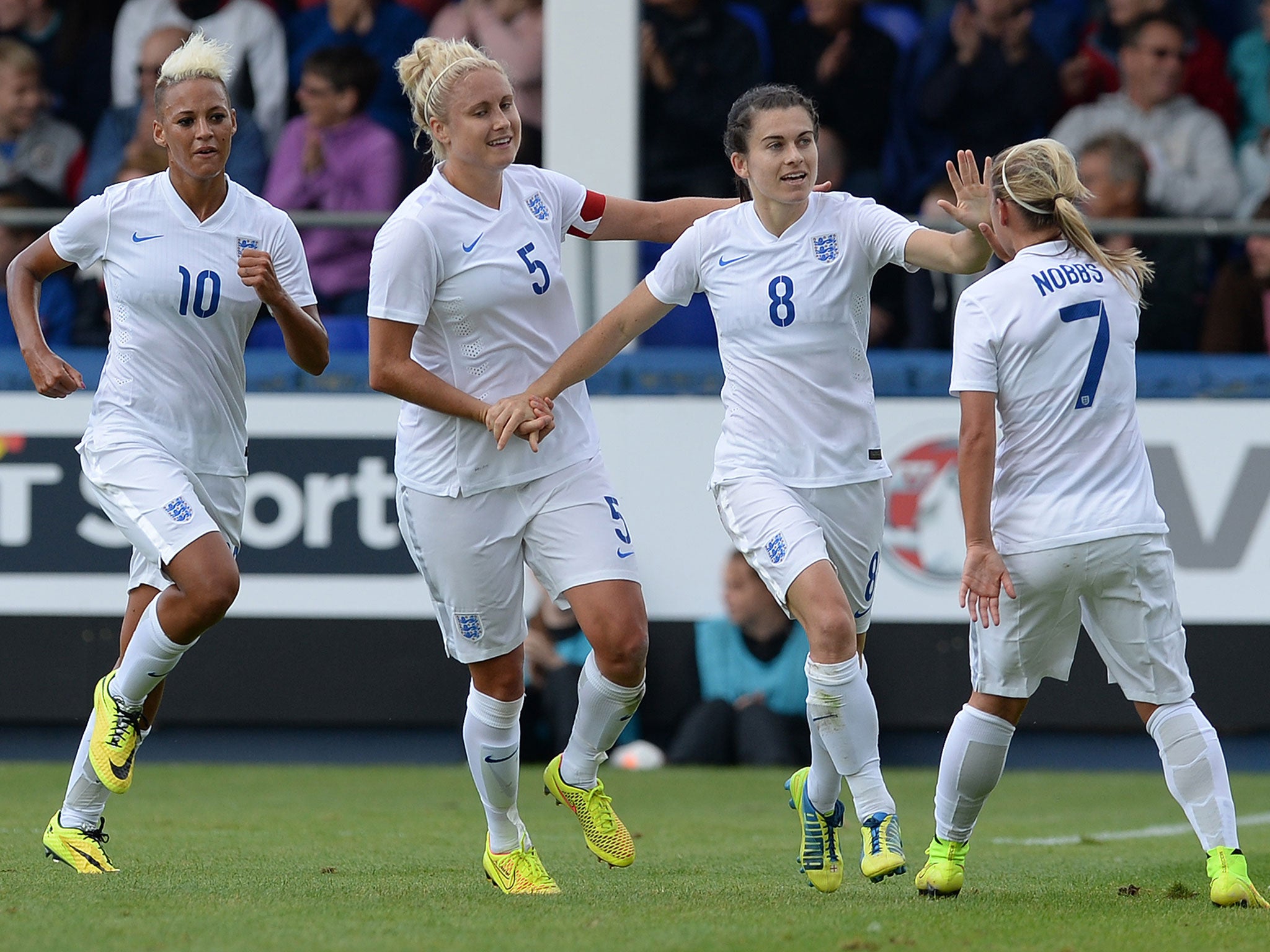 Karen Carney (No 8) will win her 100th England cap