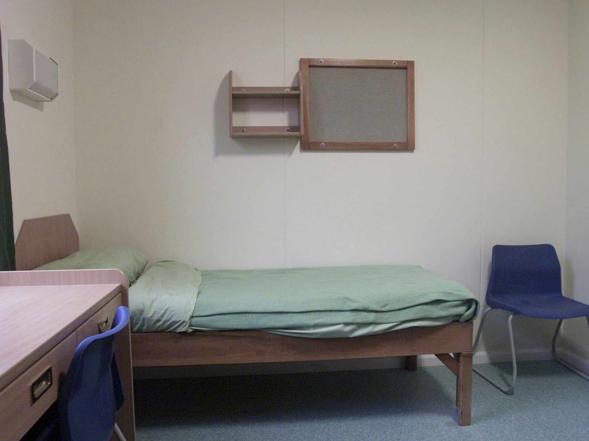 One of the facility’s sparsely furnished rooms