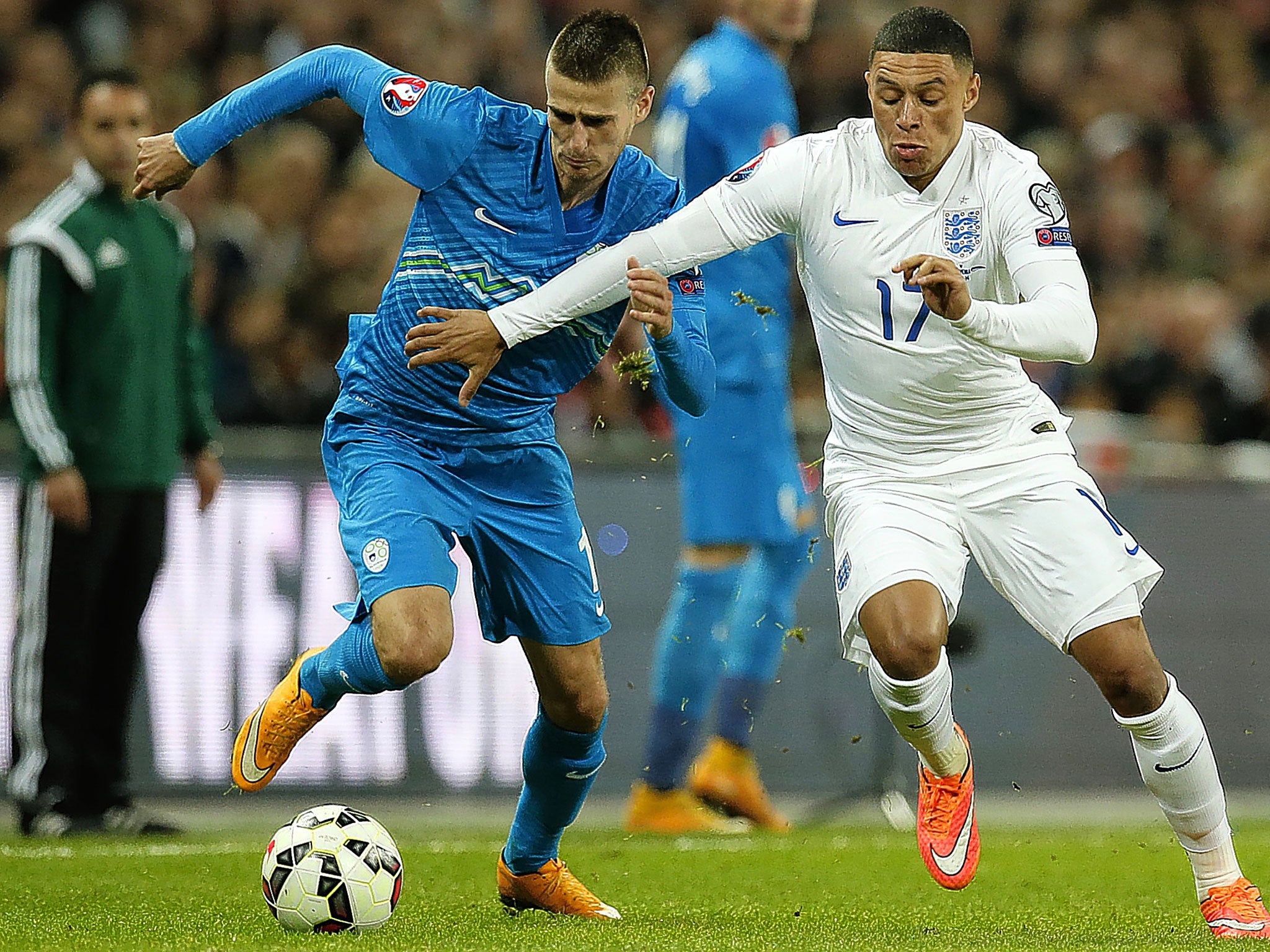 Alex Oxlade-Chamberlain (right), who came on as a substitute against Slovenia, is a strong contender to start against Scotland