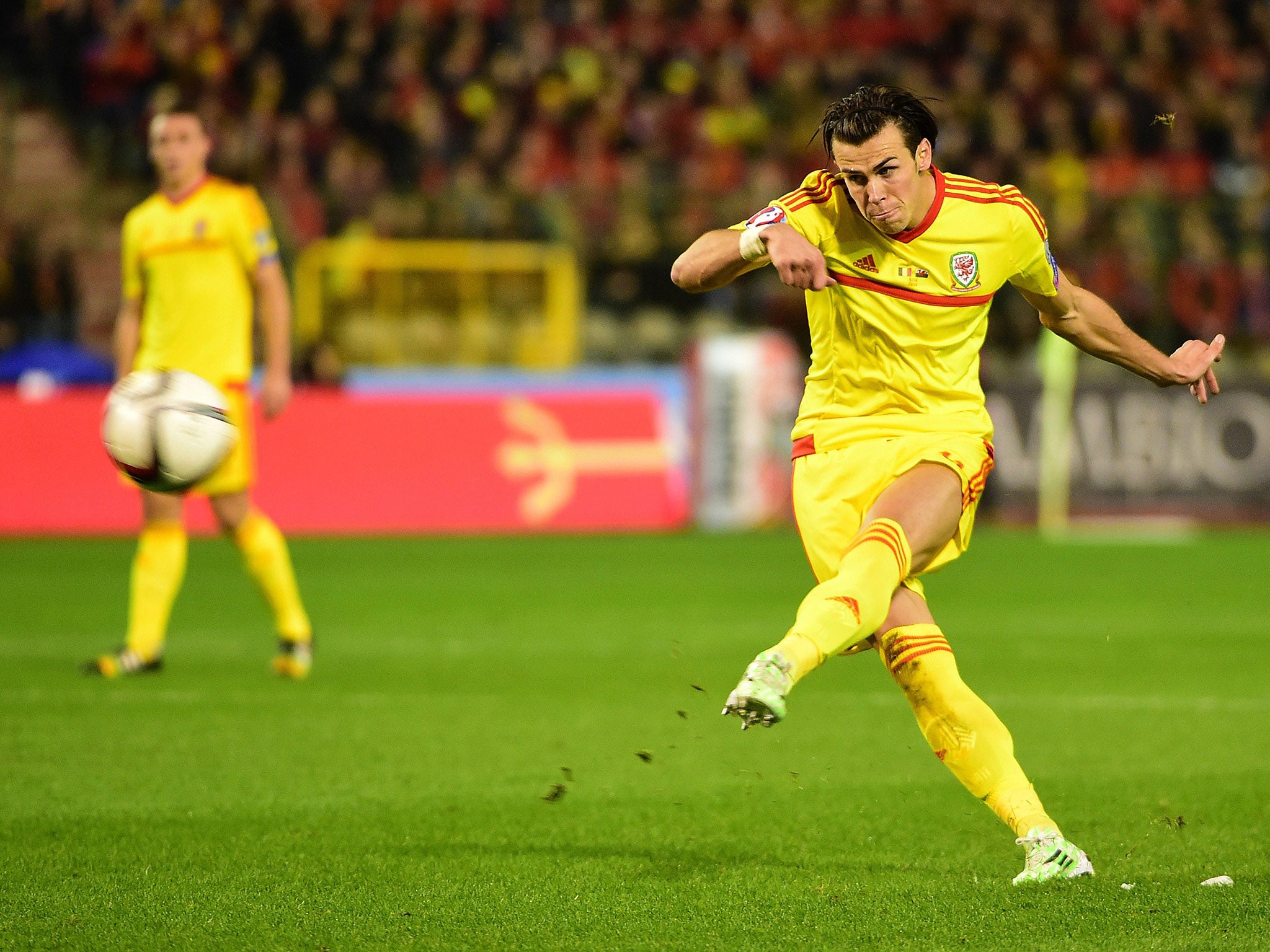 Gareth Bale strikes a free-kick during Wales goalless draw in Belgium