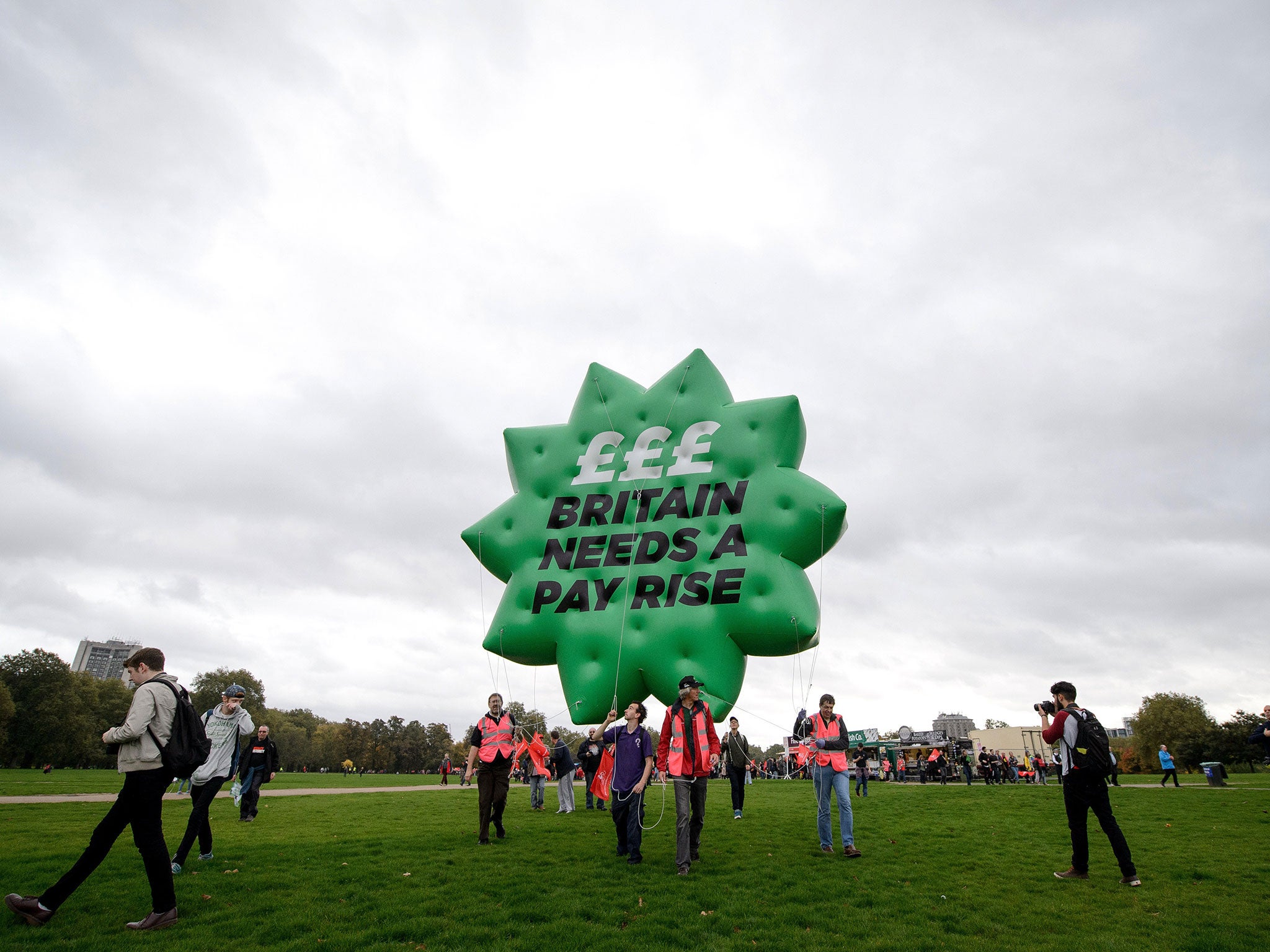 A protest against low pay in Hyde Park: before the recession wages were rising at more than 4 per cent a year