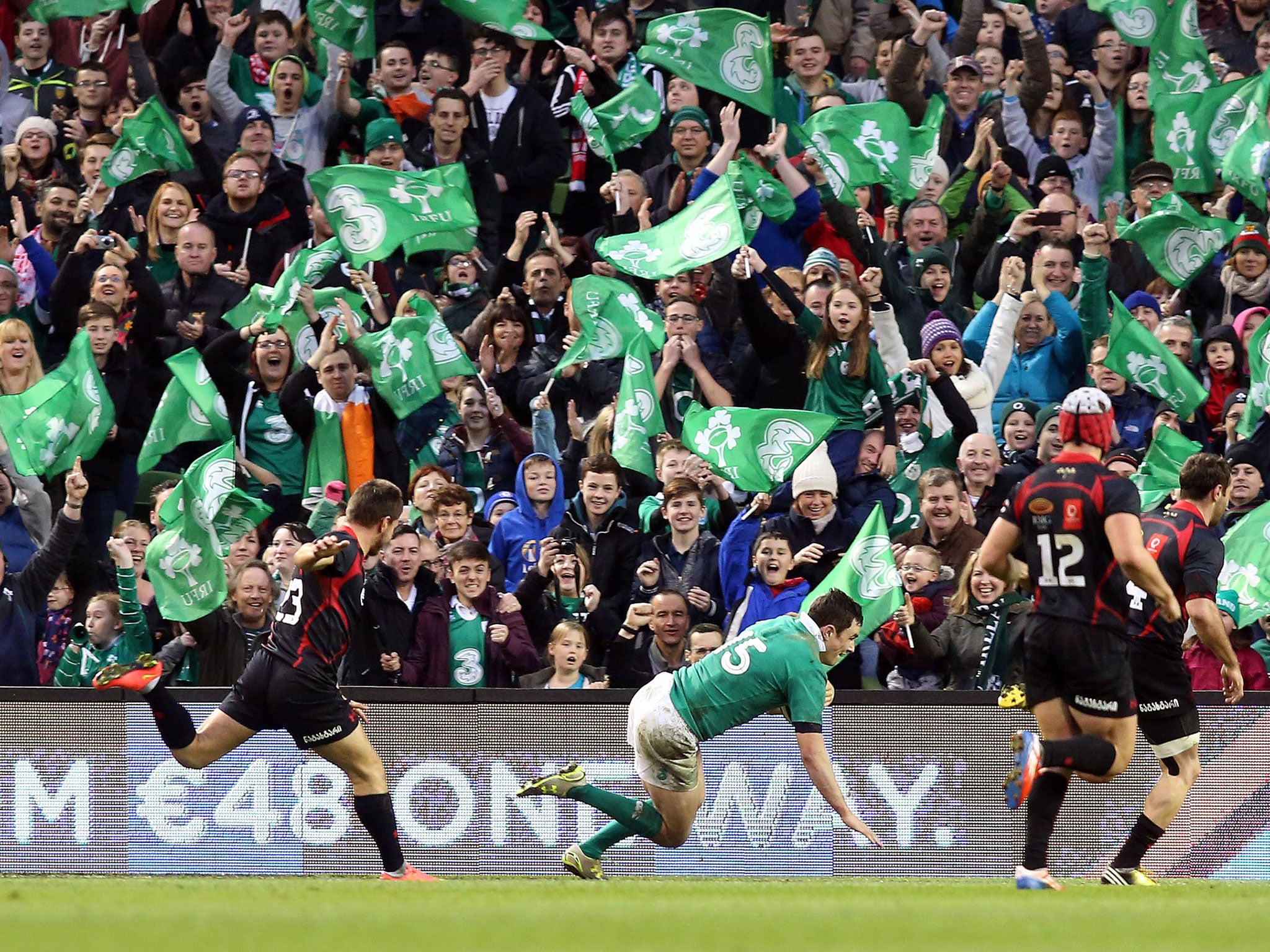 Felix Jones scores a try for Ireland in the 49-7 win over Georgia