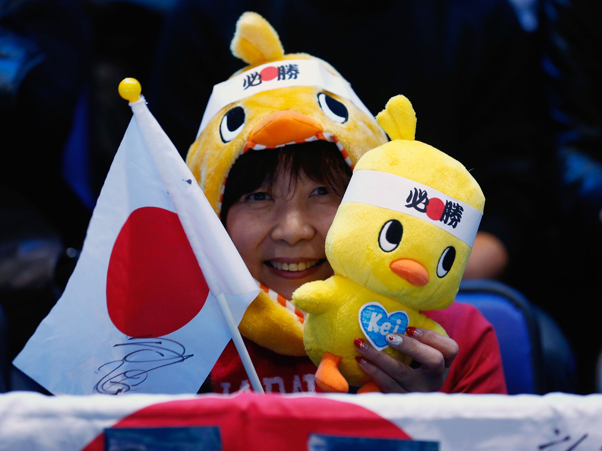A fan shows her support for Kei Nishikori in the singles semi-final match against Novak Djokovic of Serbia on day seven of the Barclays ATP World Tour Finals at O2 Arena in London