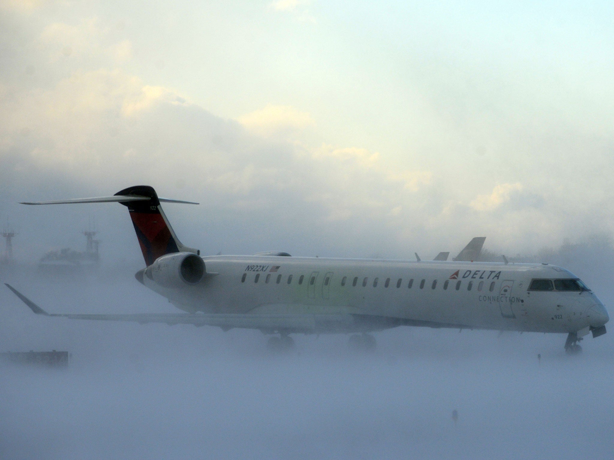 A plane on a runway at Buffalo Greater International Airport