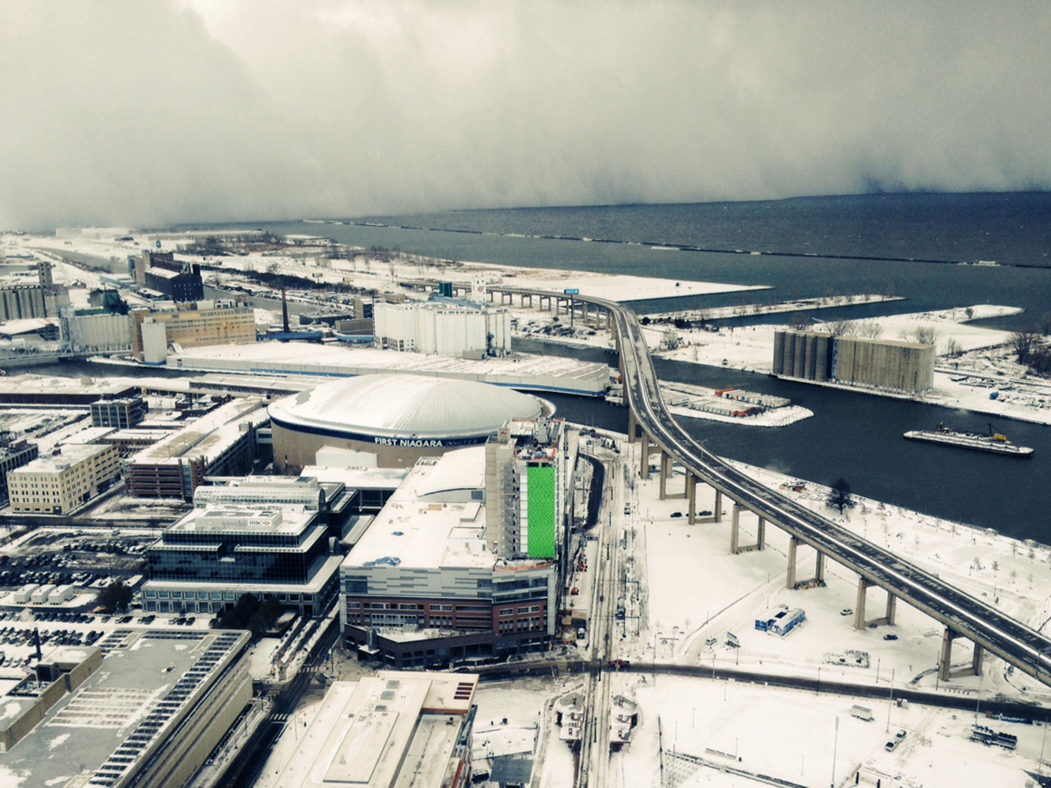 A band of storm clouds moves across Lake Erie and into Buffalo. Parts of New York measured the season's first big snowfall in feet, rather than inches, as 3 feet of lake-effect snow blanketed the Buffalo area and forced the closure of a 132-mile stretch o