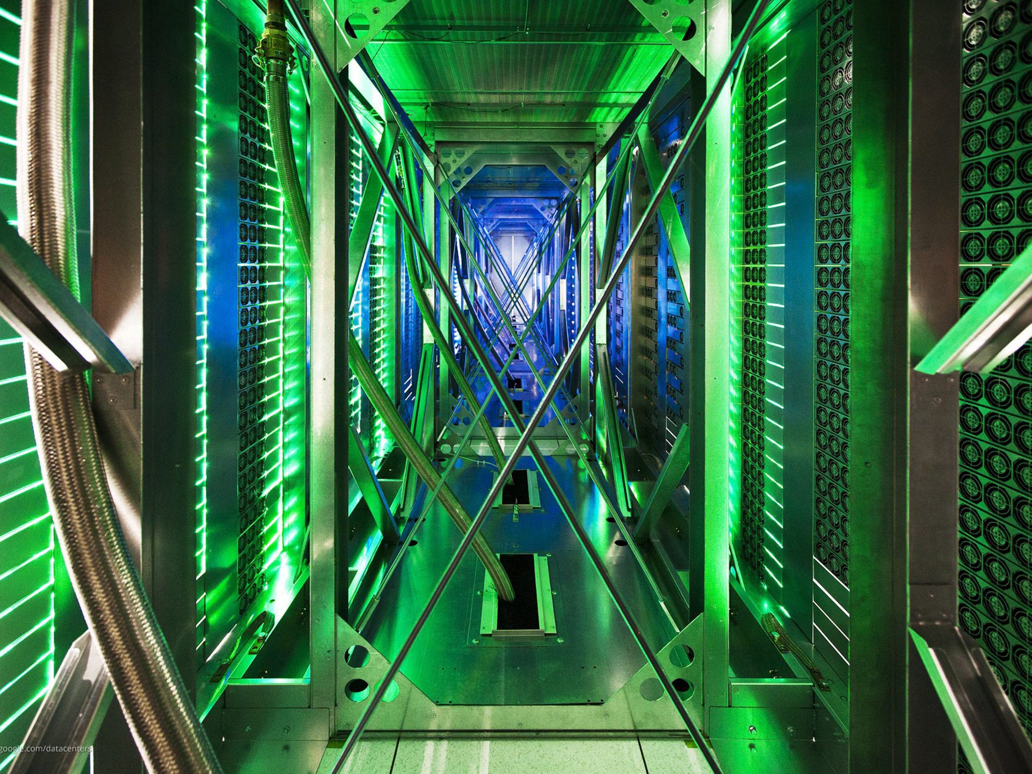 An undated handout photo provided by Google on 19 October 2012 shows hundreds of fans funnelling hot air from the server racks into a cooling unit to be recirculated in the Google data center in Pryor, Oklahoma.