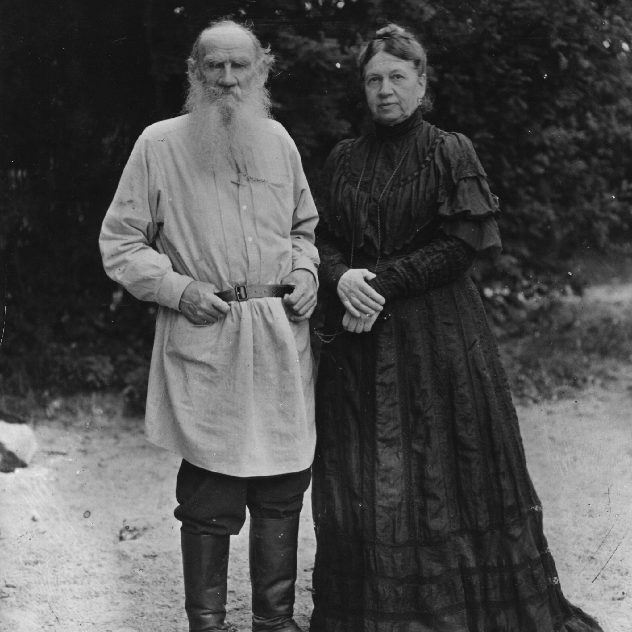 Circa 1906: Russian writer Leo Tolstoy (1828 - 1910) in the garden of his Russian home with his wife Sonya (Sofya).