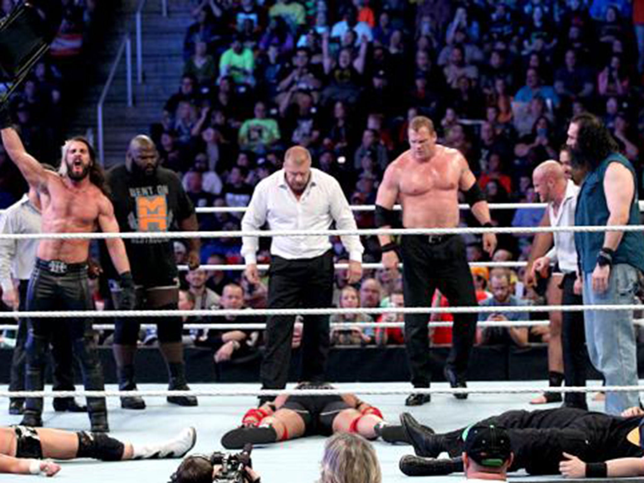 The Authority stand tall over members of Team Cena