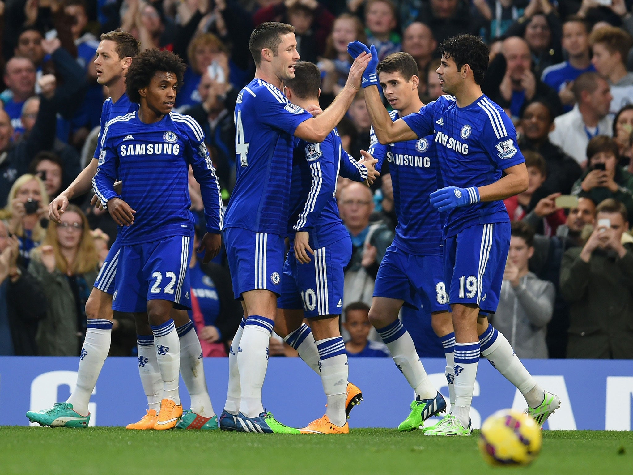 Diego Costa is congratulated by Gary Cahill after opening the scoring for Chelsea