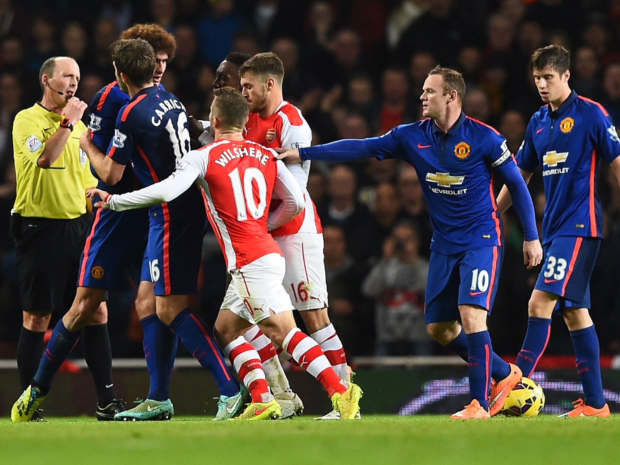 Jack Wilshere could have been sent off for head-butting Marouane Fellaini