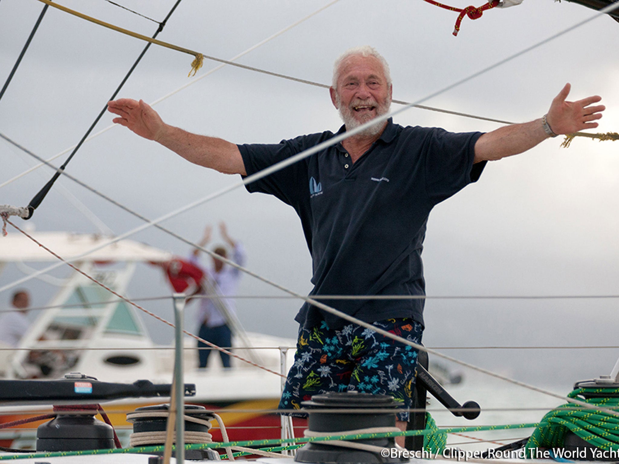 Sir Robin Knox-Johnston celebrates his third place finish