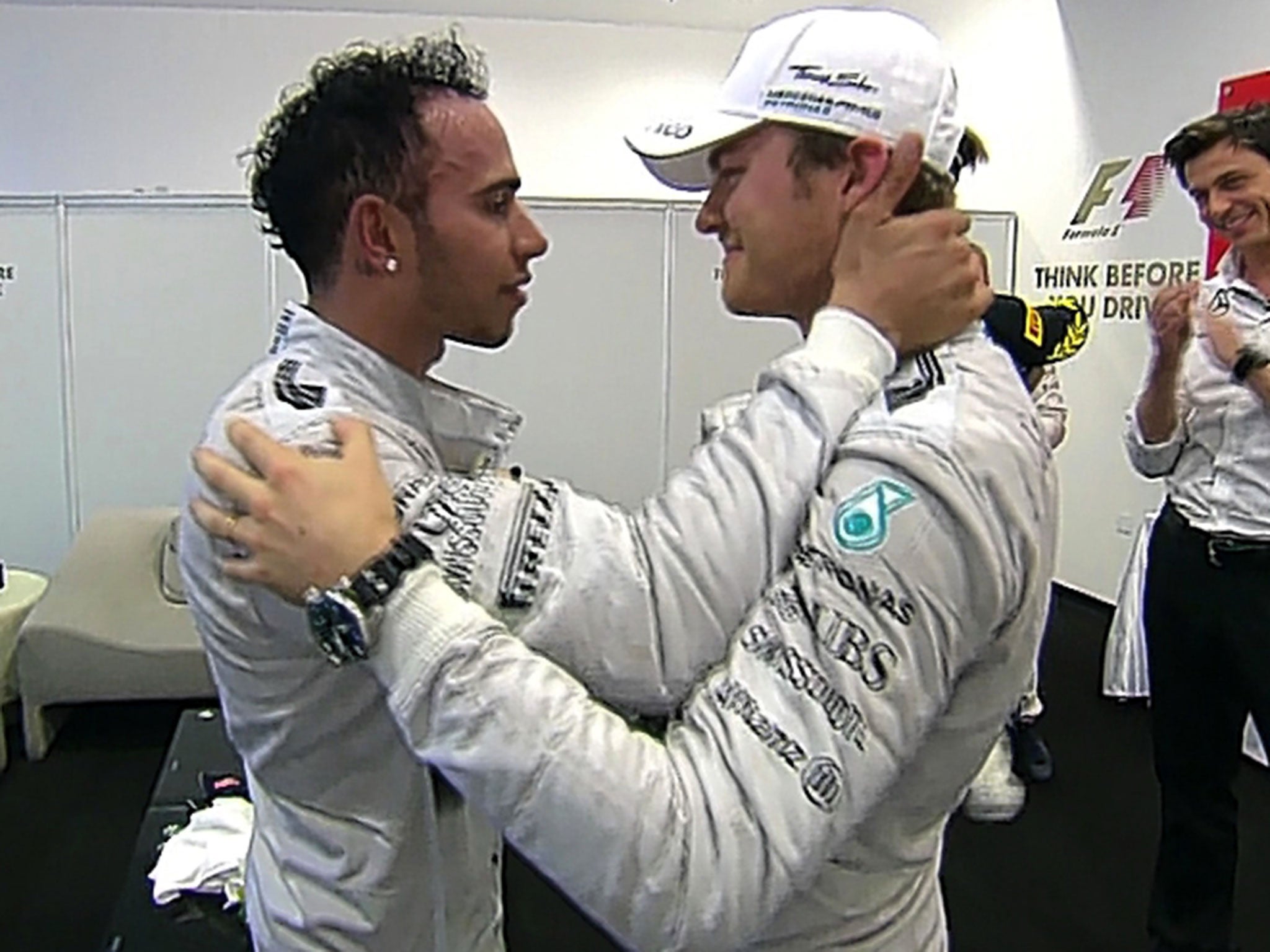 Hamilton commiserating with runner-up Nico Rosberg