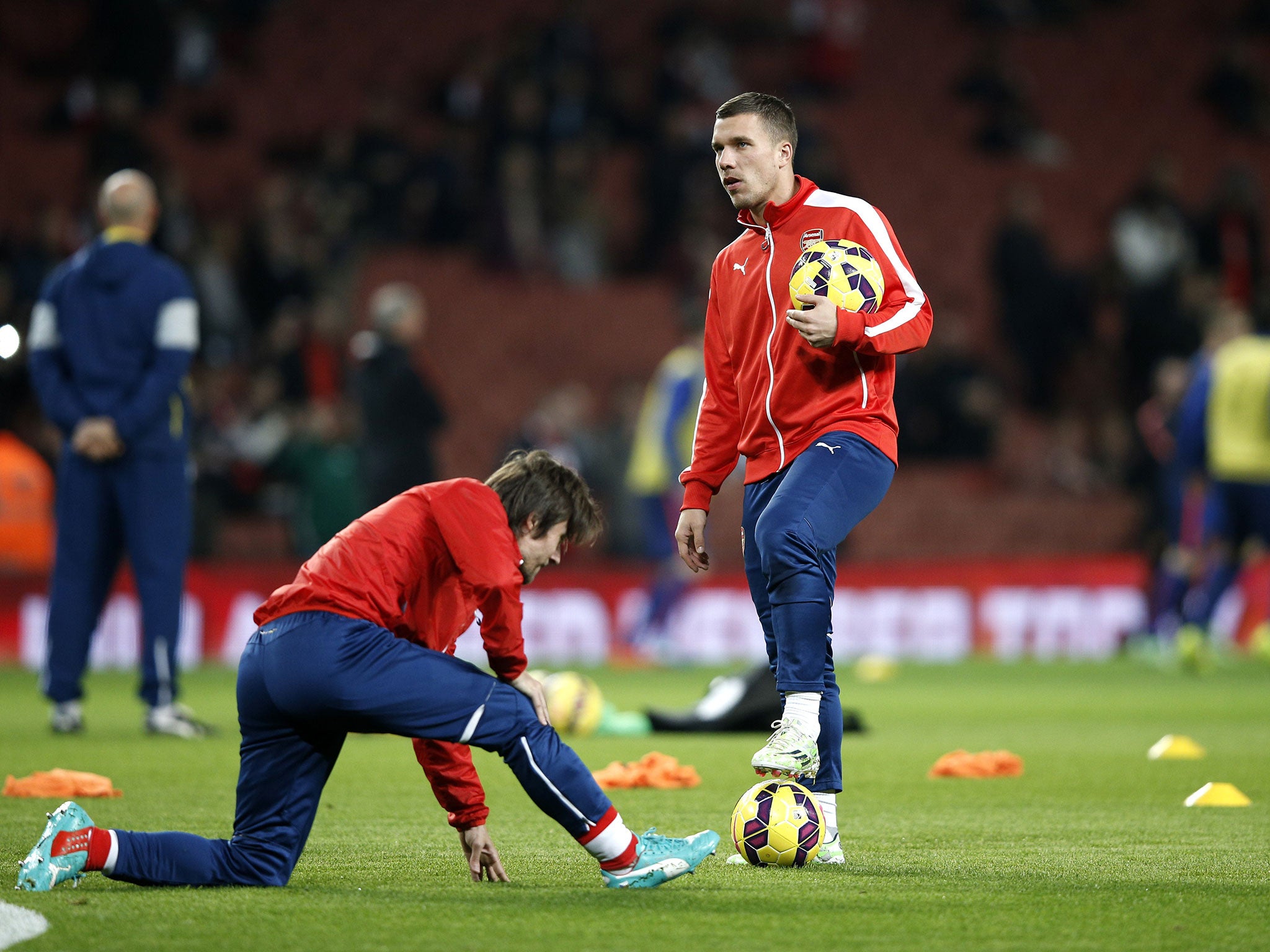 Lukas Podolski was left on the bench for the 2-1 defeat to Manchester United