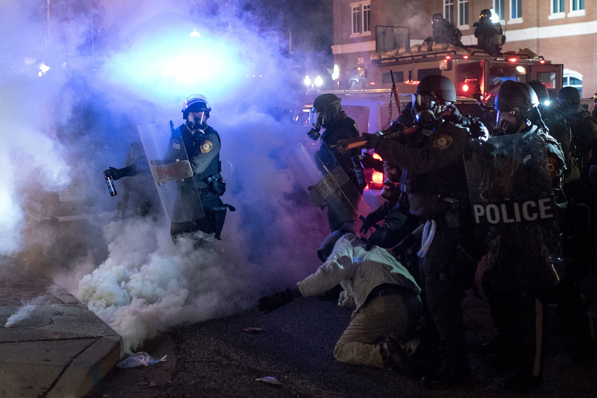 Riot policemen clash with protesters in Ferguson