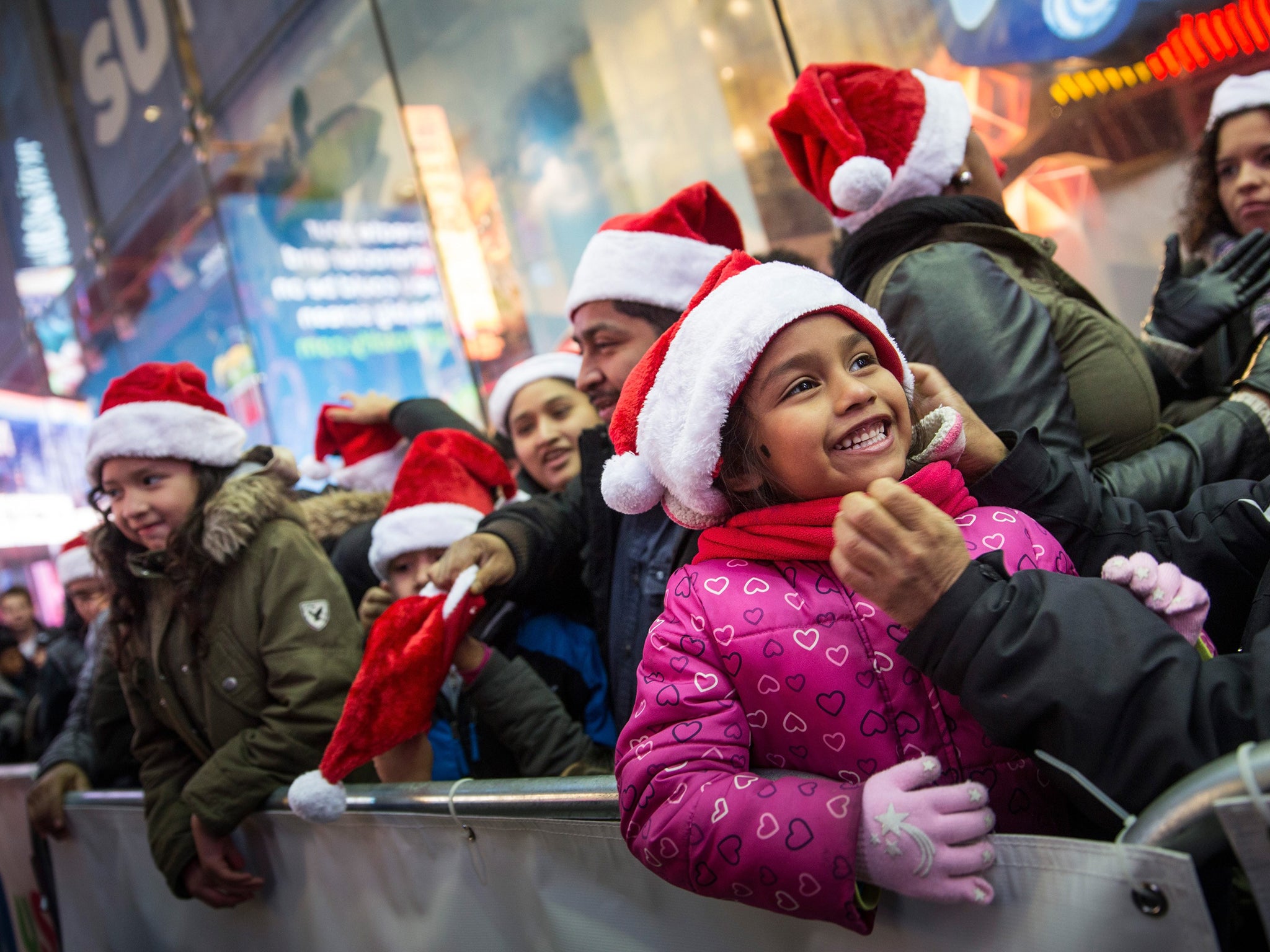 People up line to go shopping at the Toys R Us in Times Square, New York