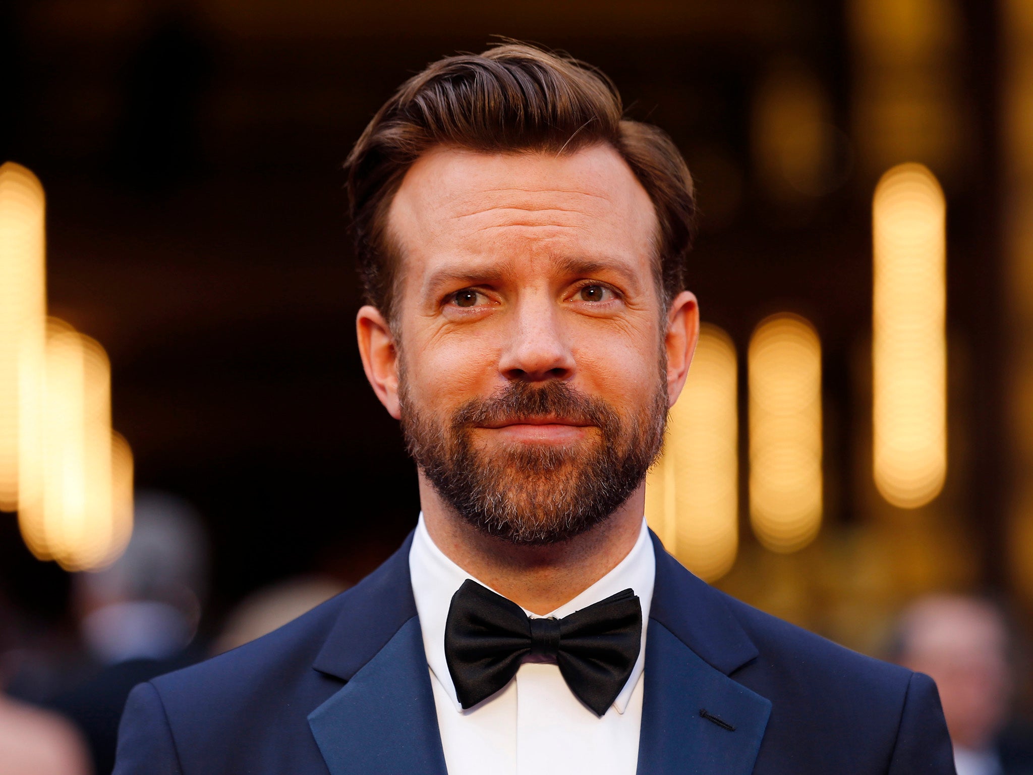 Jason Sudeikis arrives at the 86th Academy Awards in Hollywood, California March 2, 2014.