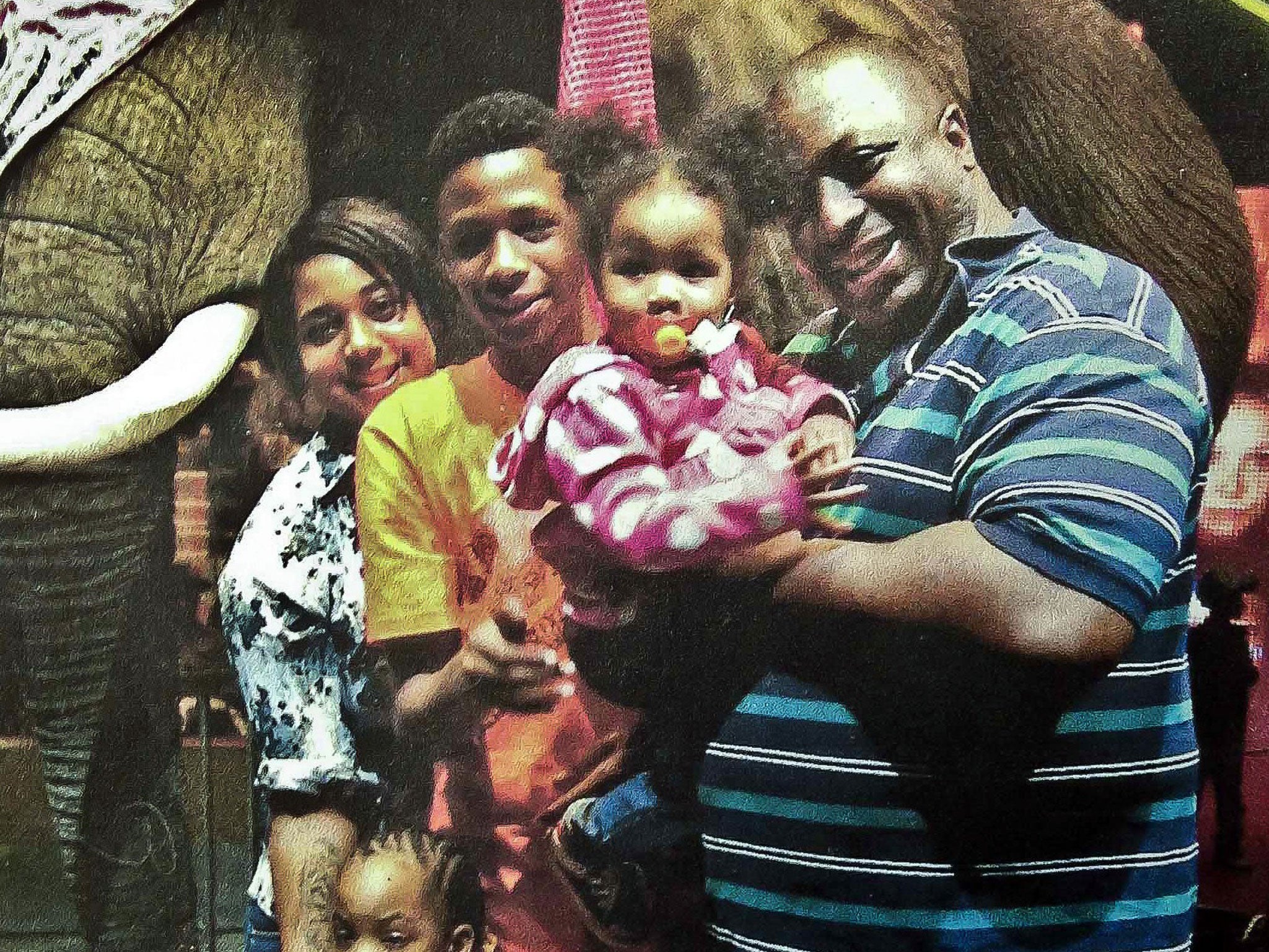 Eric Garner, right, with some of his six children during a family outing