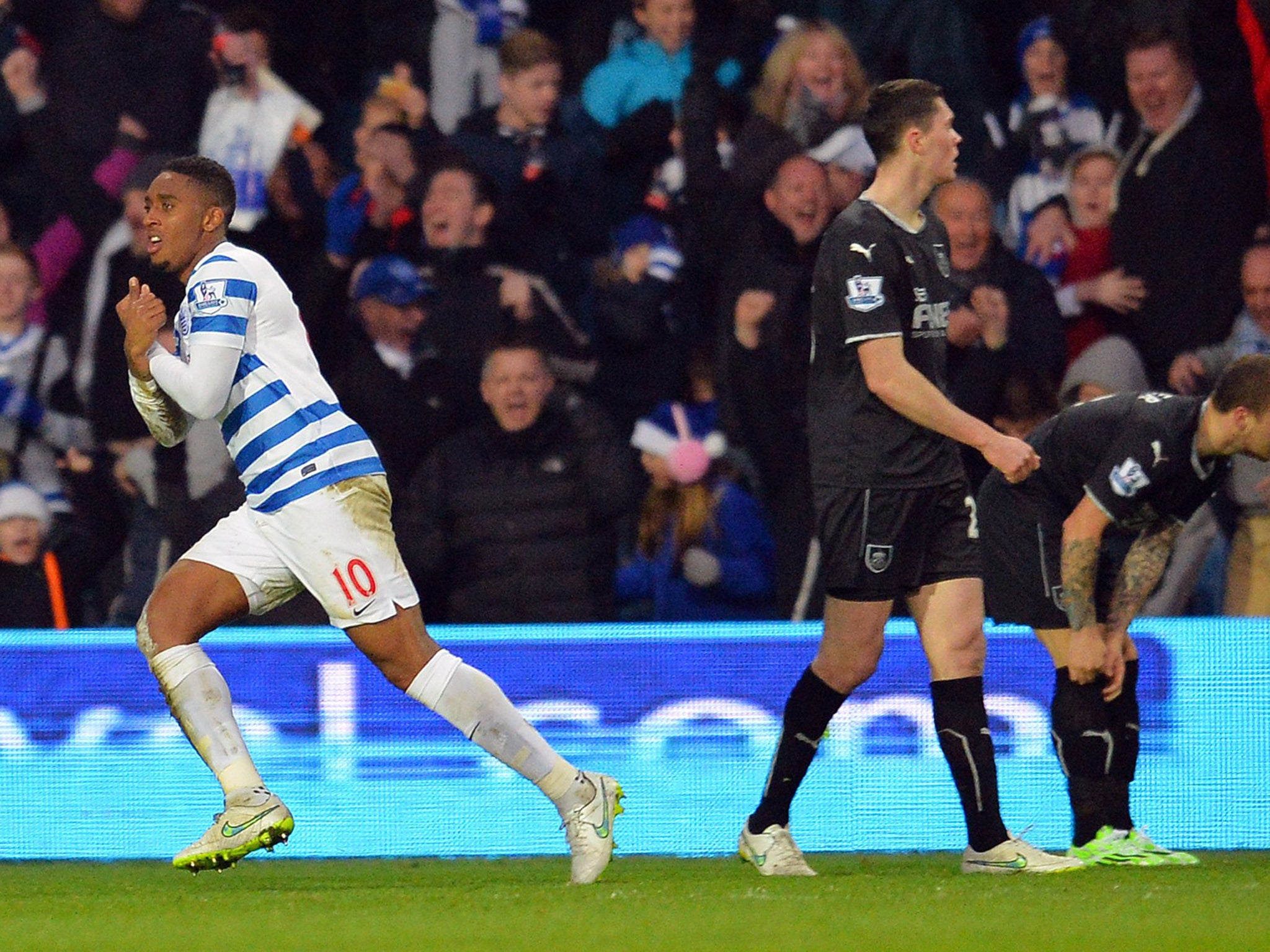 Leroy Fer celebrates scoring the opening goal