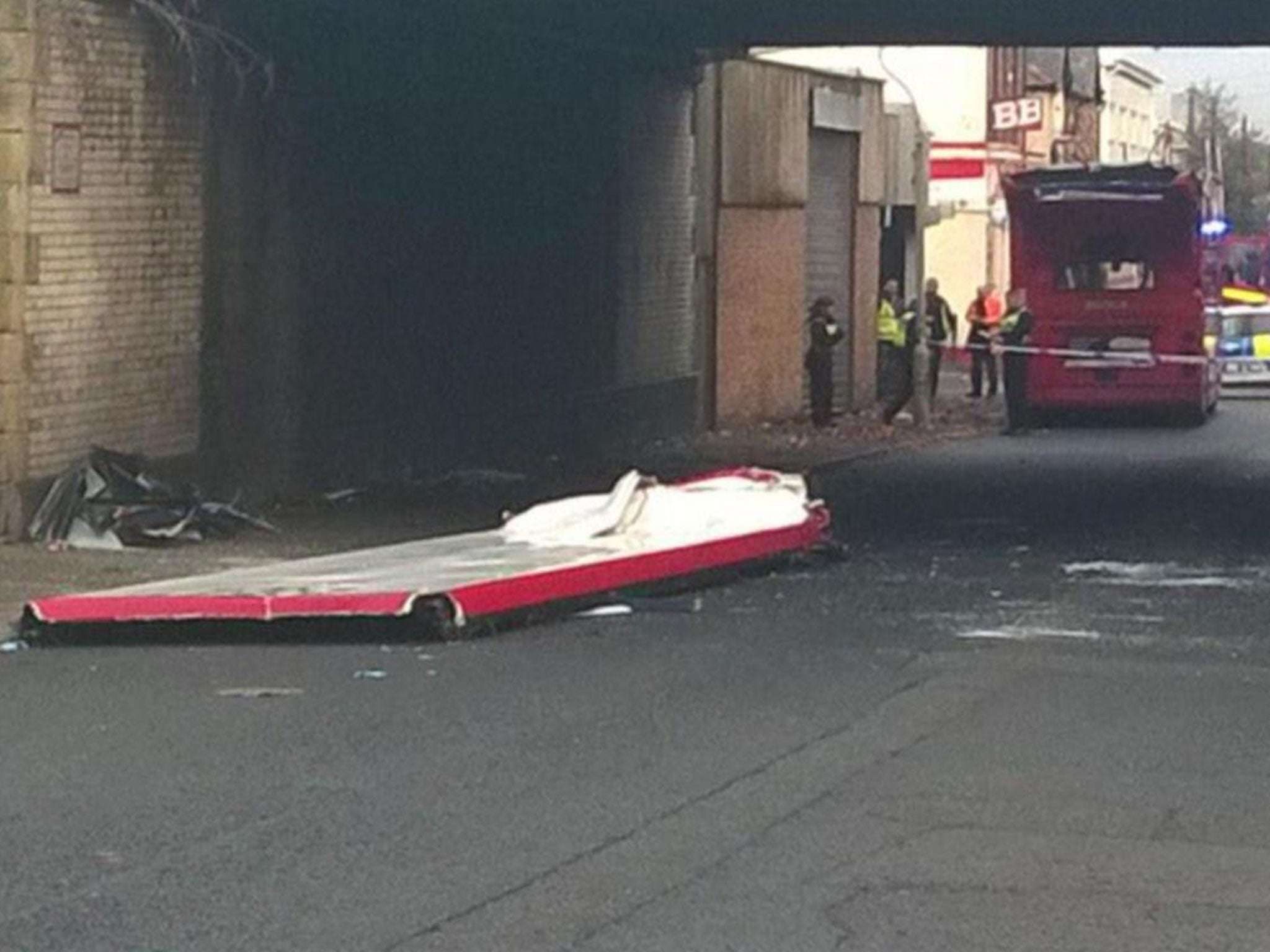 The rail replacement bus had its roof ripped off. Picture: Tom Munns