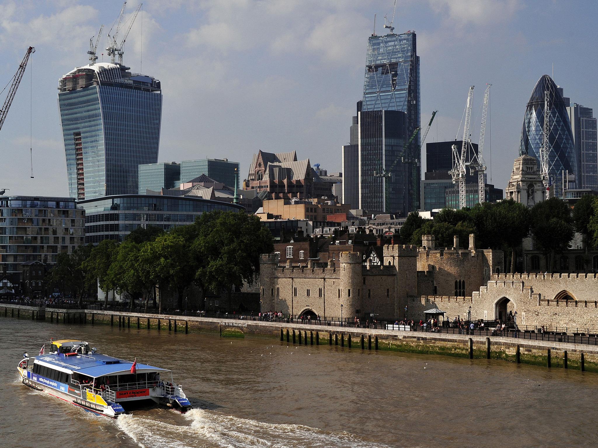 A view of the new 'Walkie Talkie' tower (L), the 'Cheesegrater' (C) and the 'Gherkin' (R) in central London