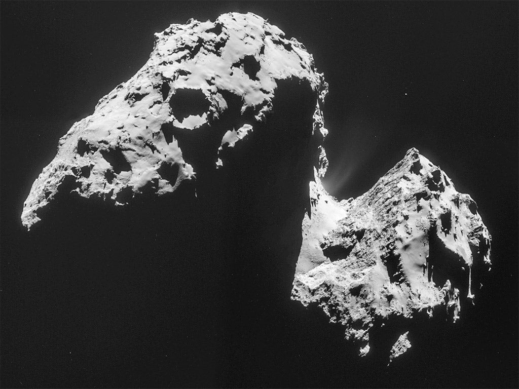 A picture comprised of four images taken by Rosetta as it approached the comet