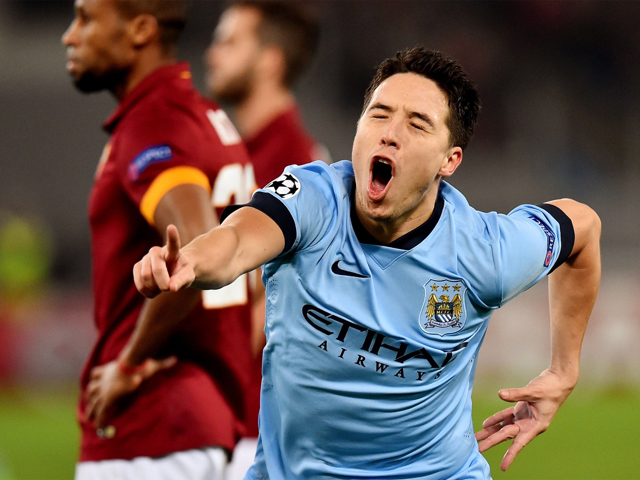 Manchester City's Samir Nasri celebrates after scoring