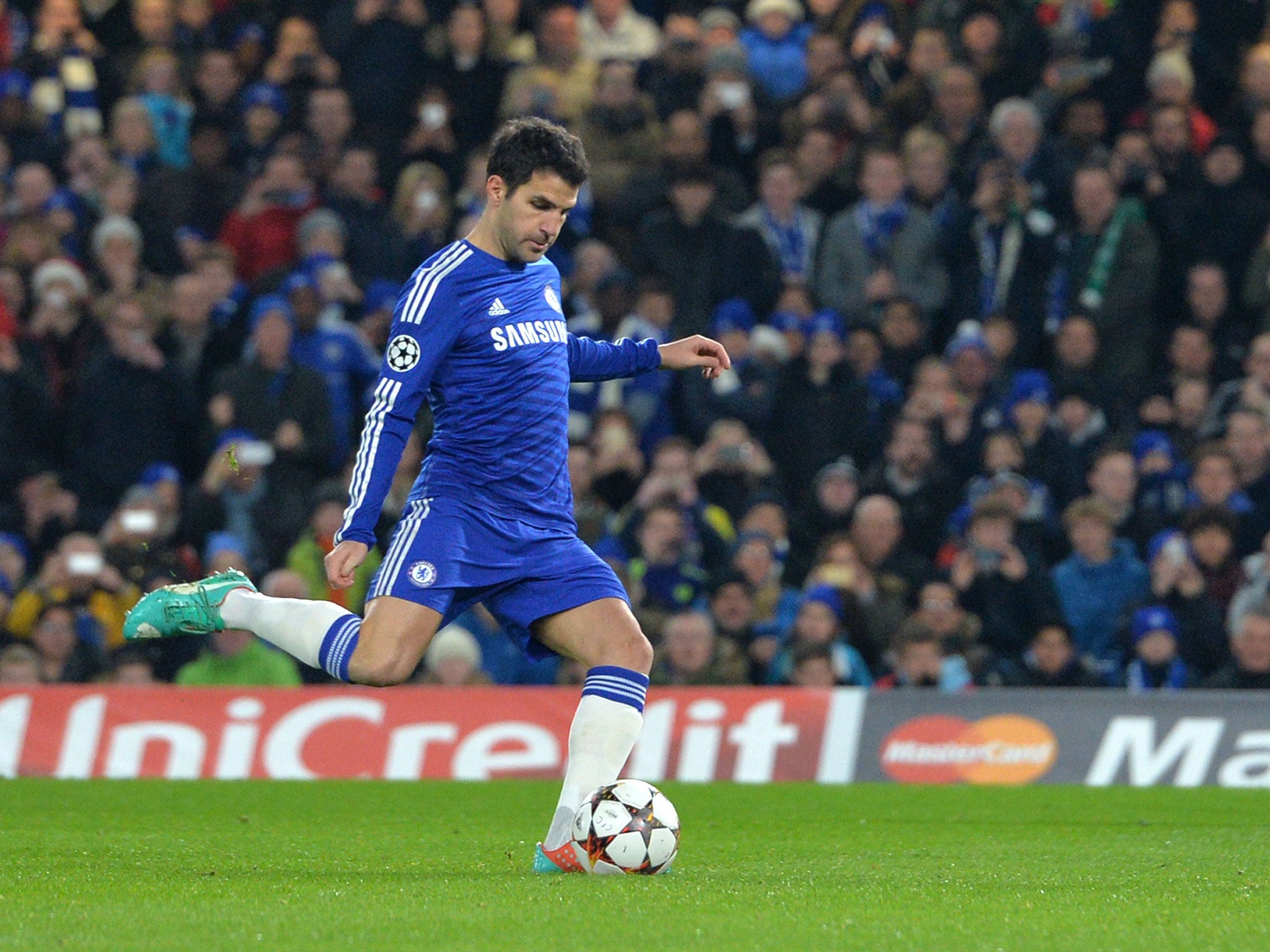 Cesc Fabregas converts from the penalty spot