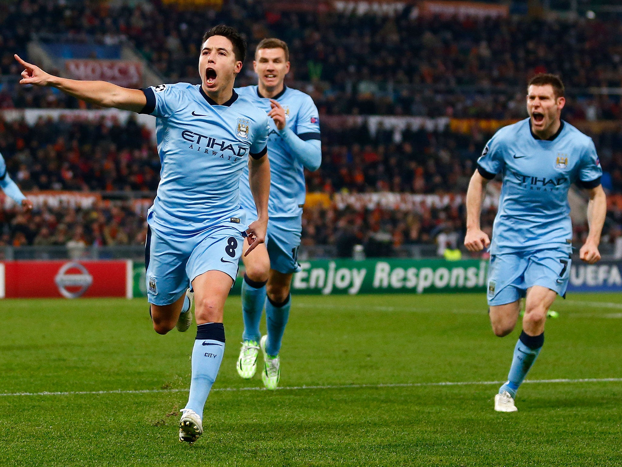 Samir Nasri celebrates his goal against Roma