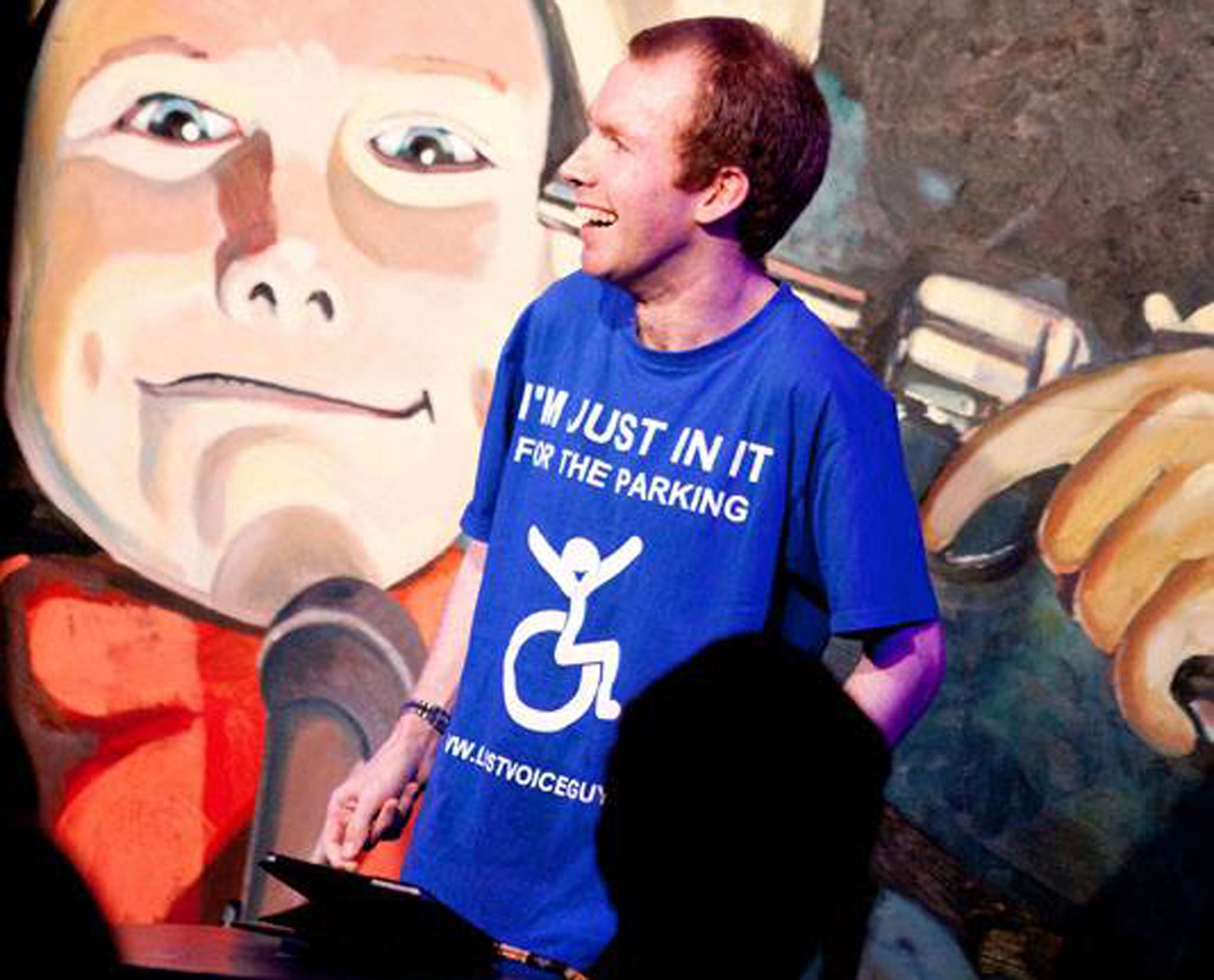 Lost Voice Guy performs on stage at The Stand, Newcastle upon Tyne