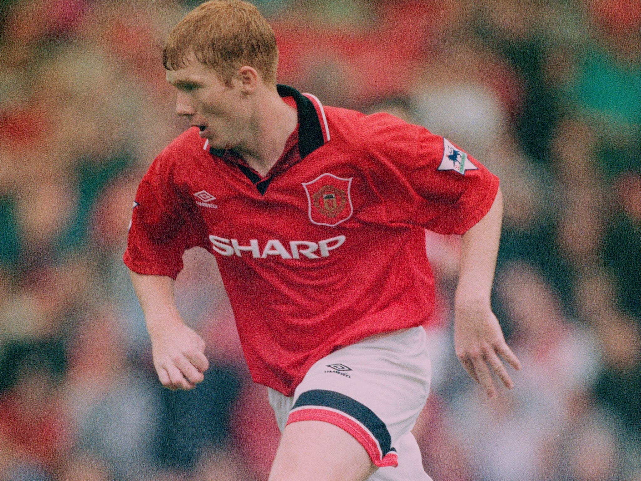 Paul Scholes playing against Wimbledon in his third league appearance of the 1995-96 season for Manchester United