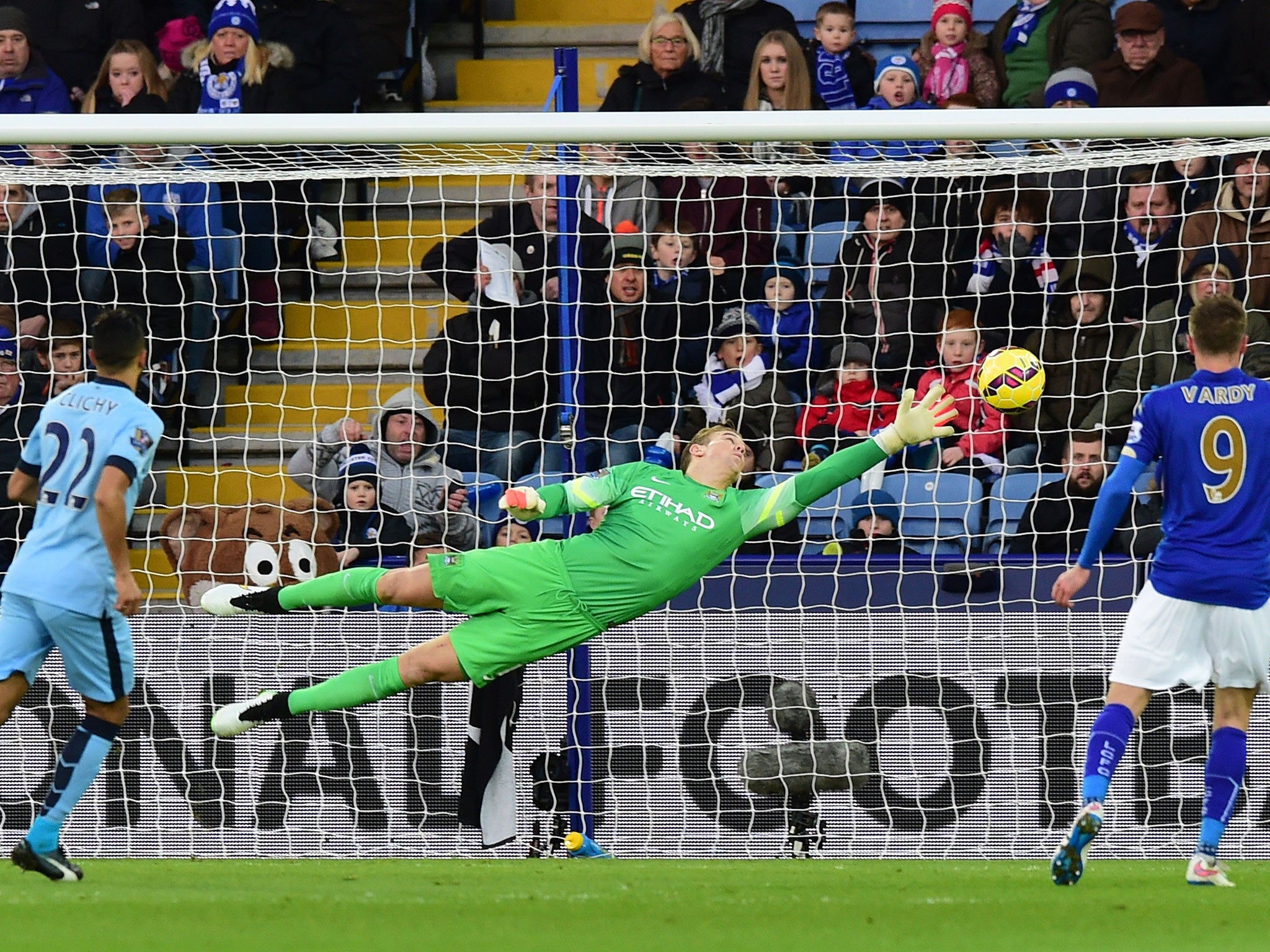 Joe Hart pulls off a fantastic save from Esteban Cambiasso's free-kick