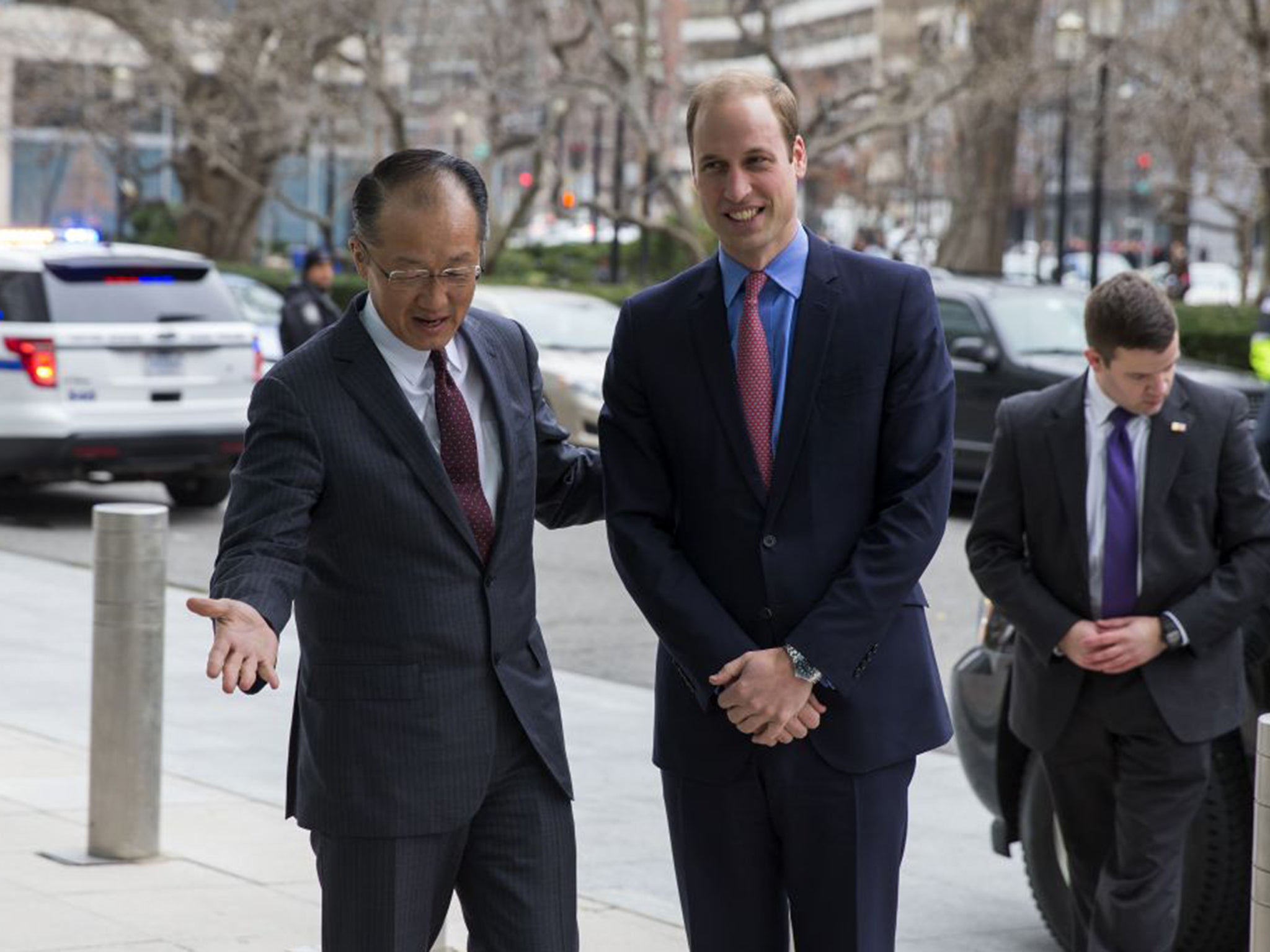 Prince William is greeted by World Bank President Jim Yong Kim before speaking during an International Corruption Hunters Alliance event at the World Bank in Washington