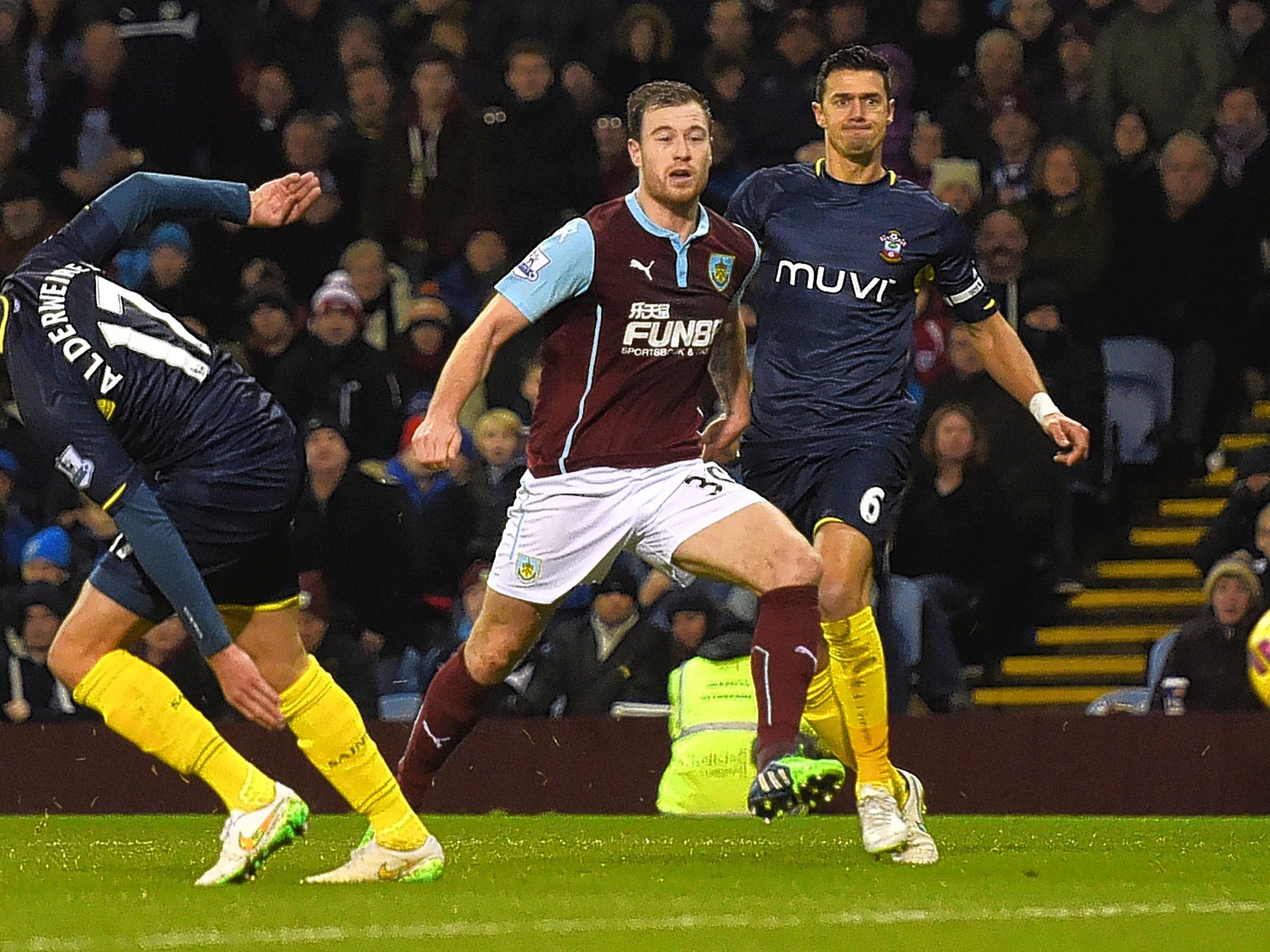 Jose Fonte watches on as Ashley Barnes