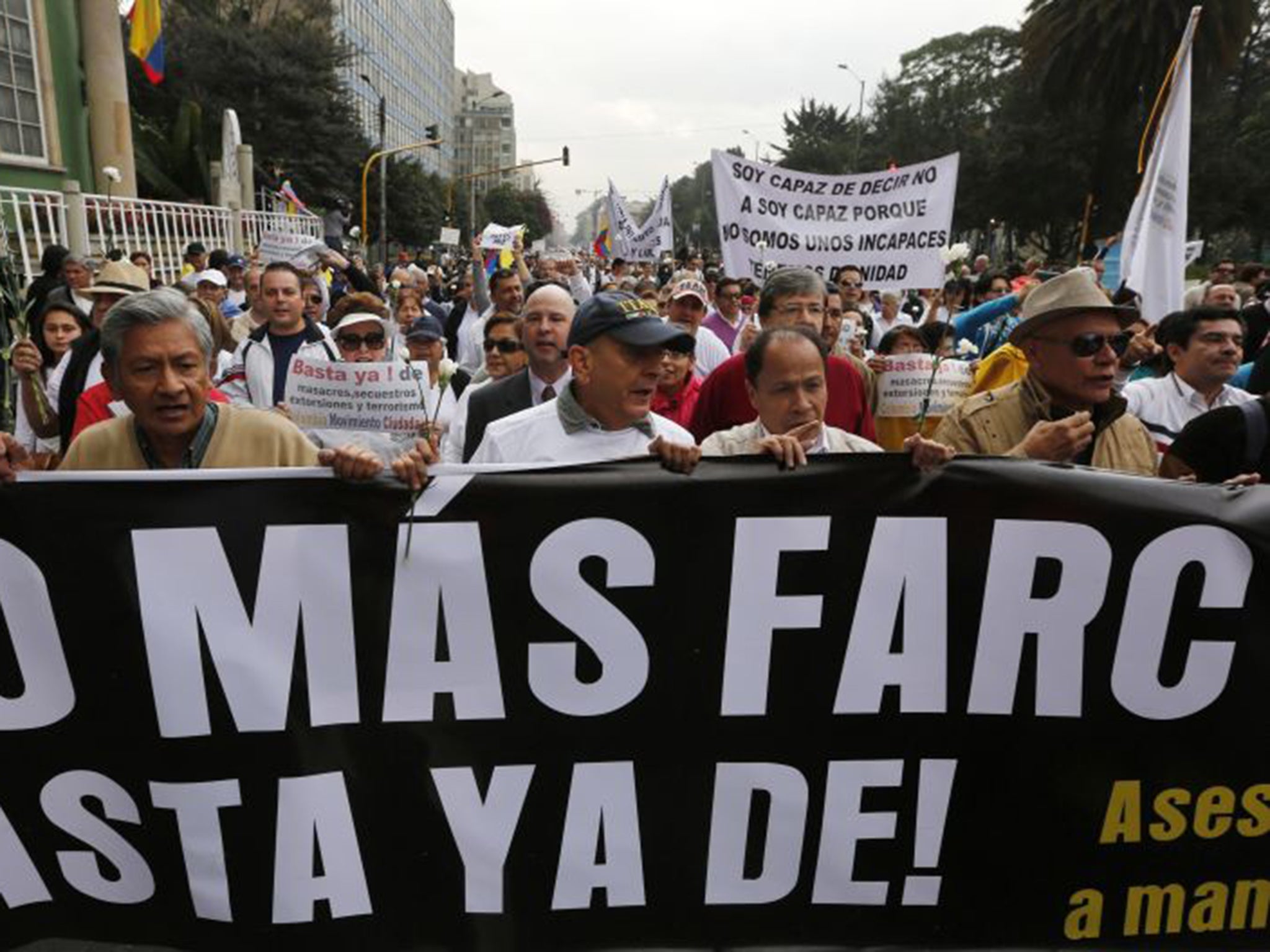 Protesters in Bogota call on the leftist rebels to end the violence that has killed 220,000 people