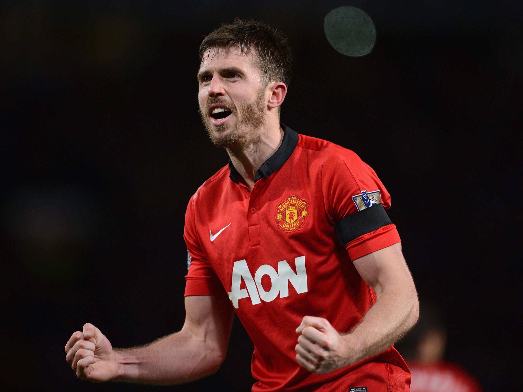 Carrick celebrates Manchester United's win over Liverpool