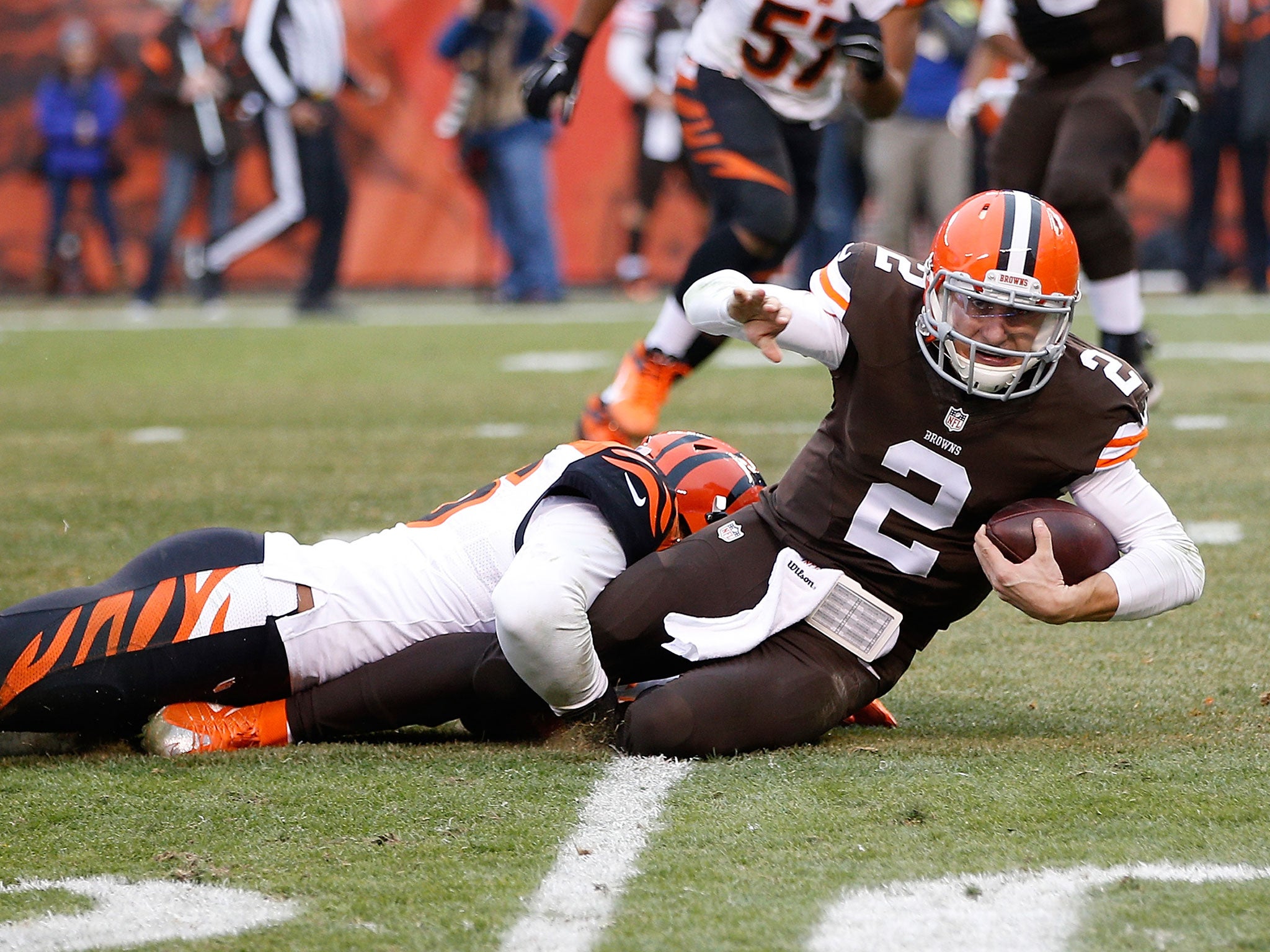 Johnny Manziel finished with 10 of 18 for 80 yards and two interceptions while being sacked three times