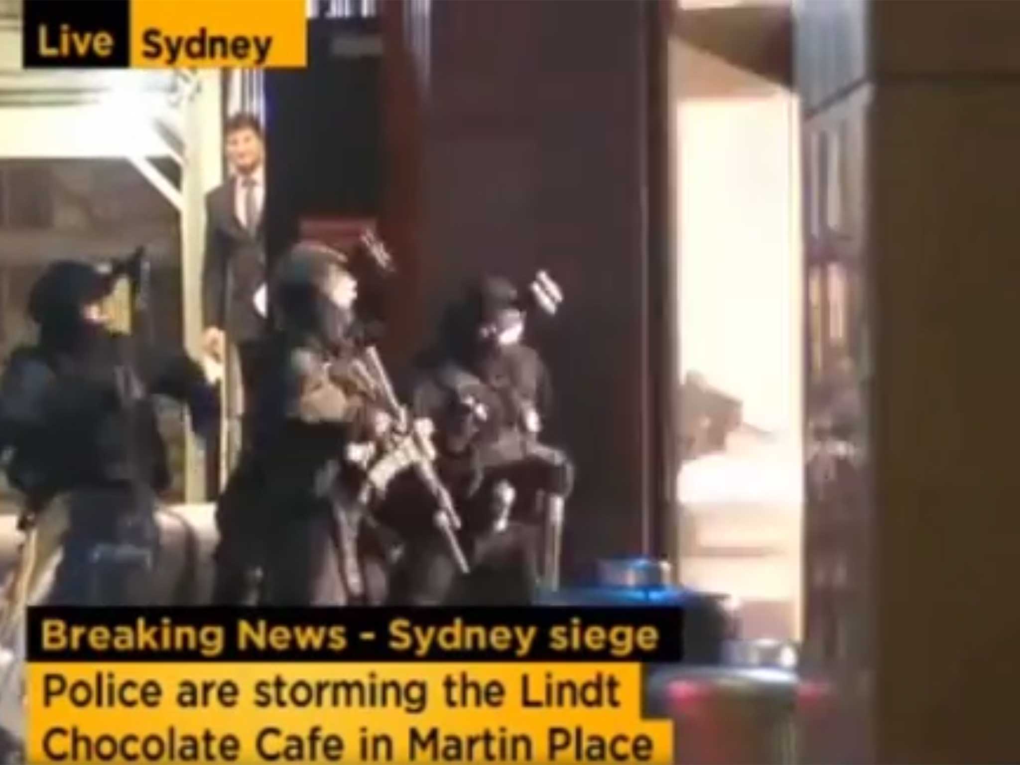 Officers enter the building