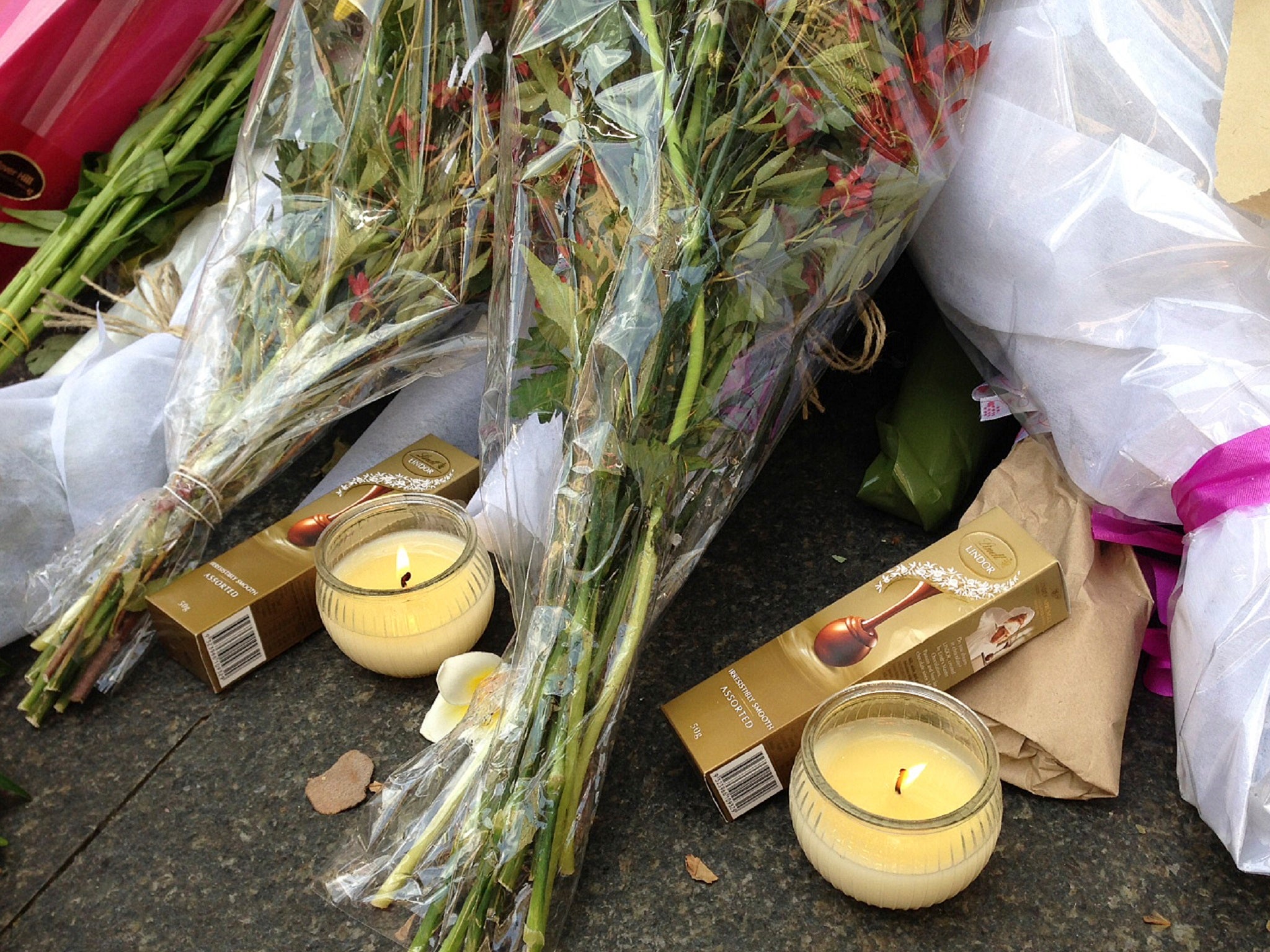 Lindt chocolate and flowers left by mourners paying tribute