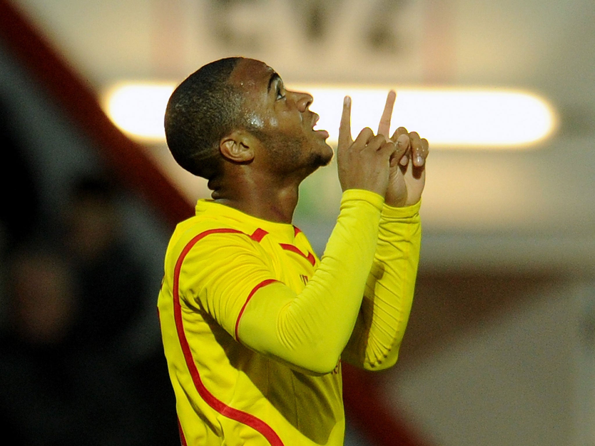 Raheem Sterling celebrates his second for Liverpool