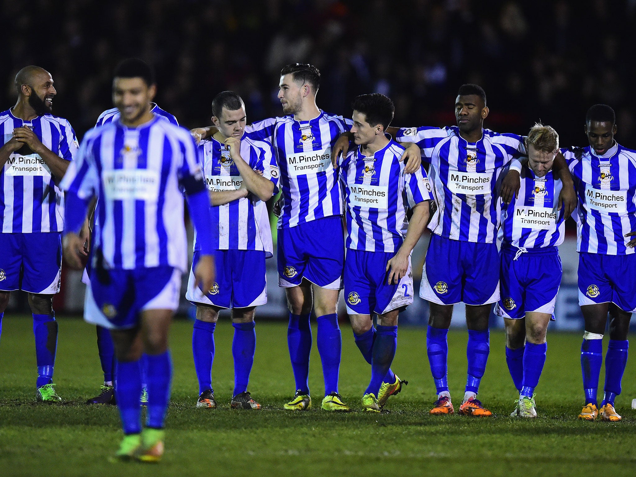 Worcester players react during the penalty shoot out