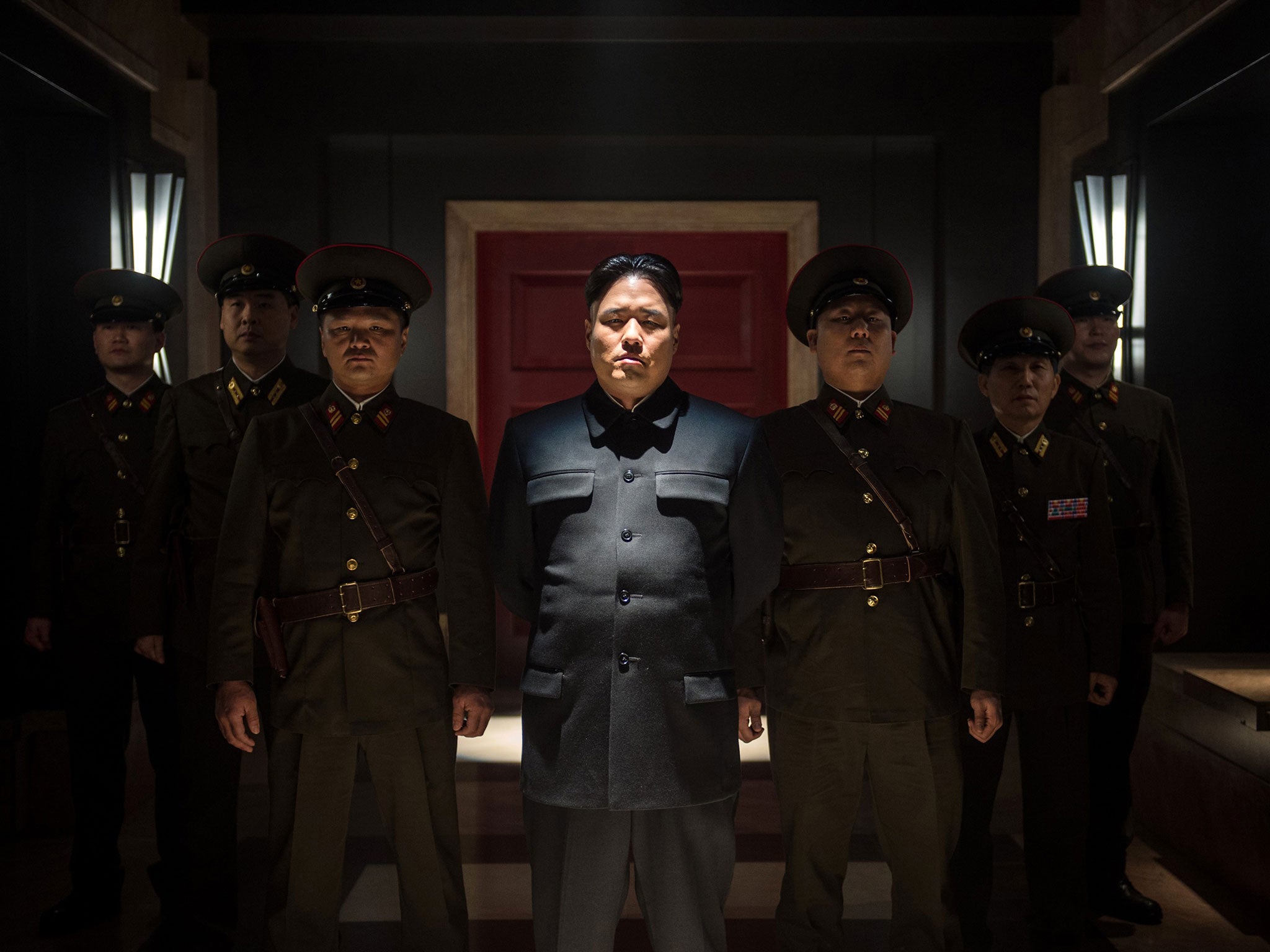 A still from The Interview, showing Randall Park as Kim Jong-Un