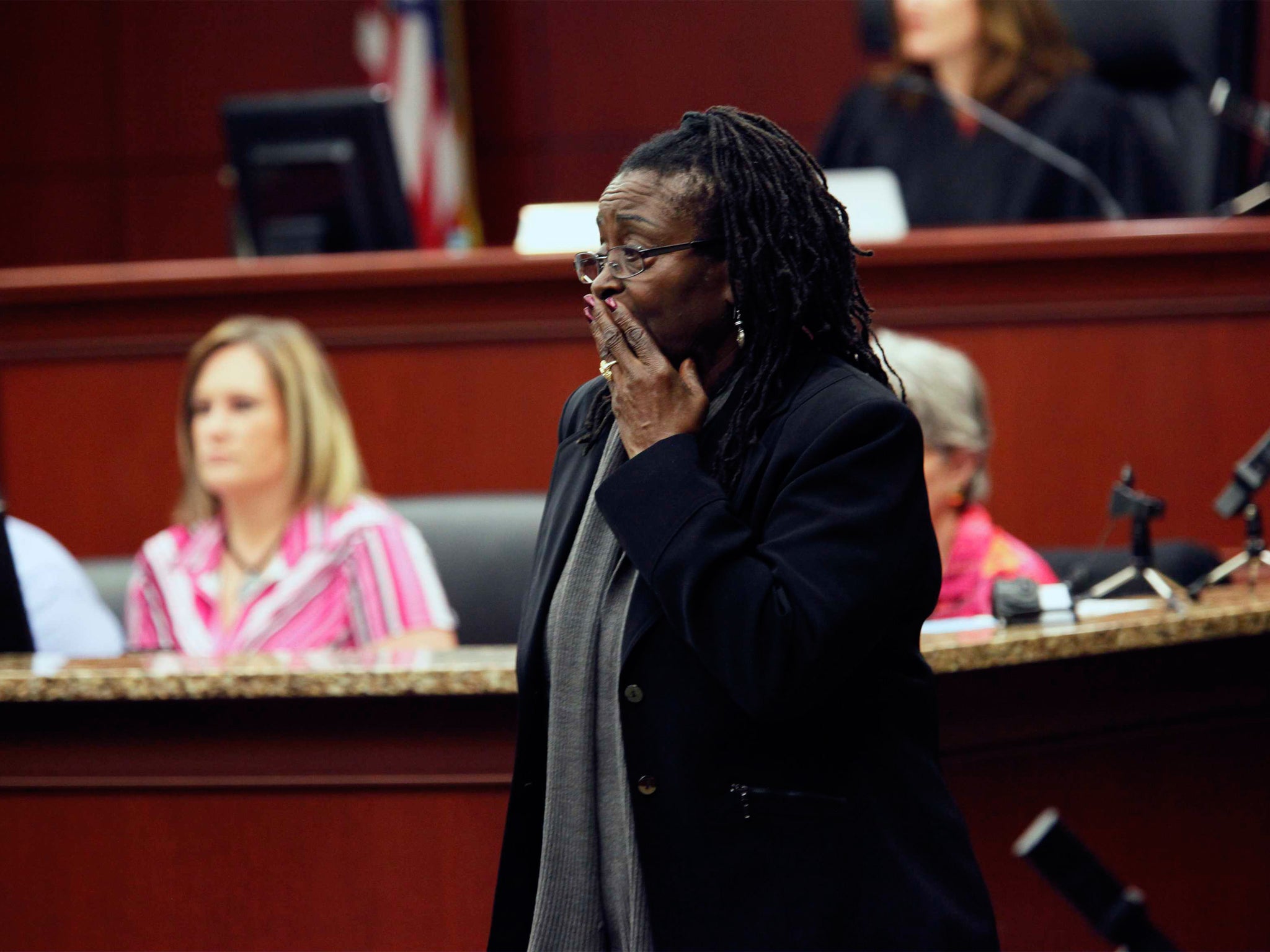 Defense witness Katherine Stinney-Robinson leaves the stand after her testimony in the case for her brother in January