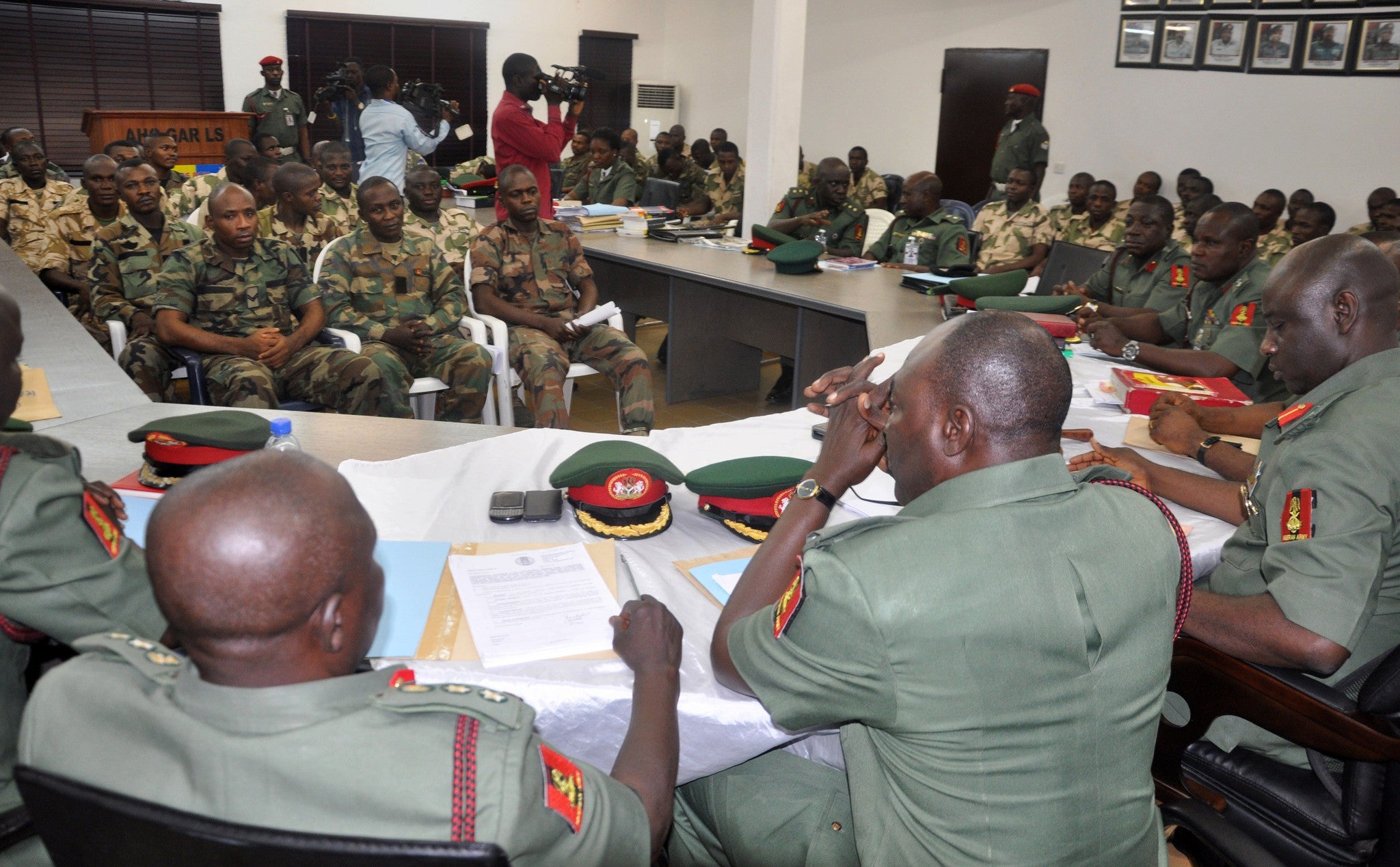 In this Wednesday, October 15, 2014 file photo, soldiers accused of refusing to fight in the country's northeastern Islamic uprising appear before a court martial in Abuja, Nigeria