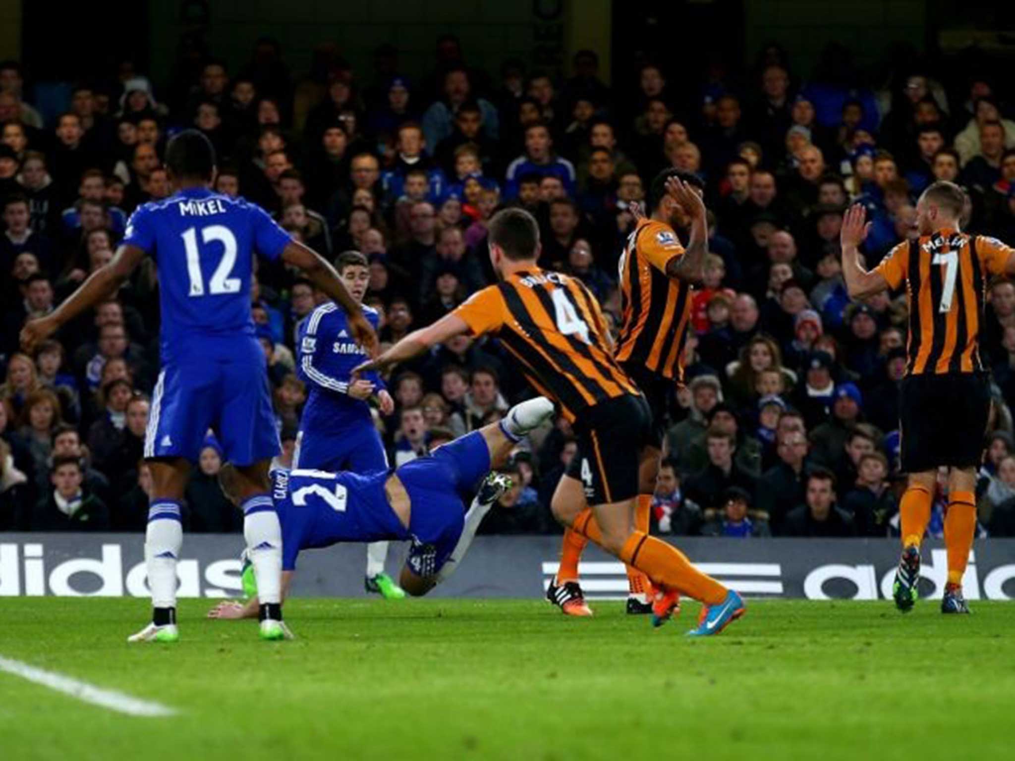 Cahill goes down during the match with Hull City