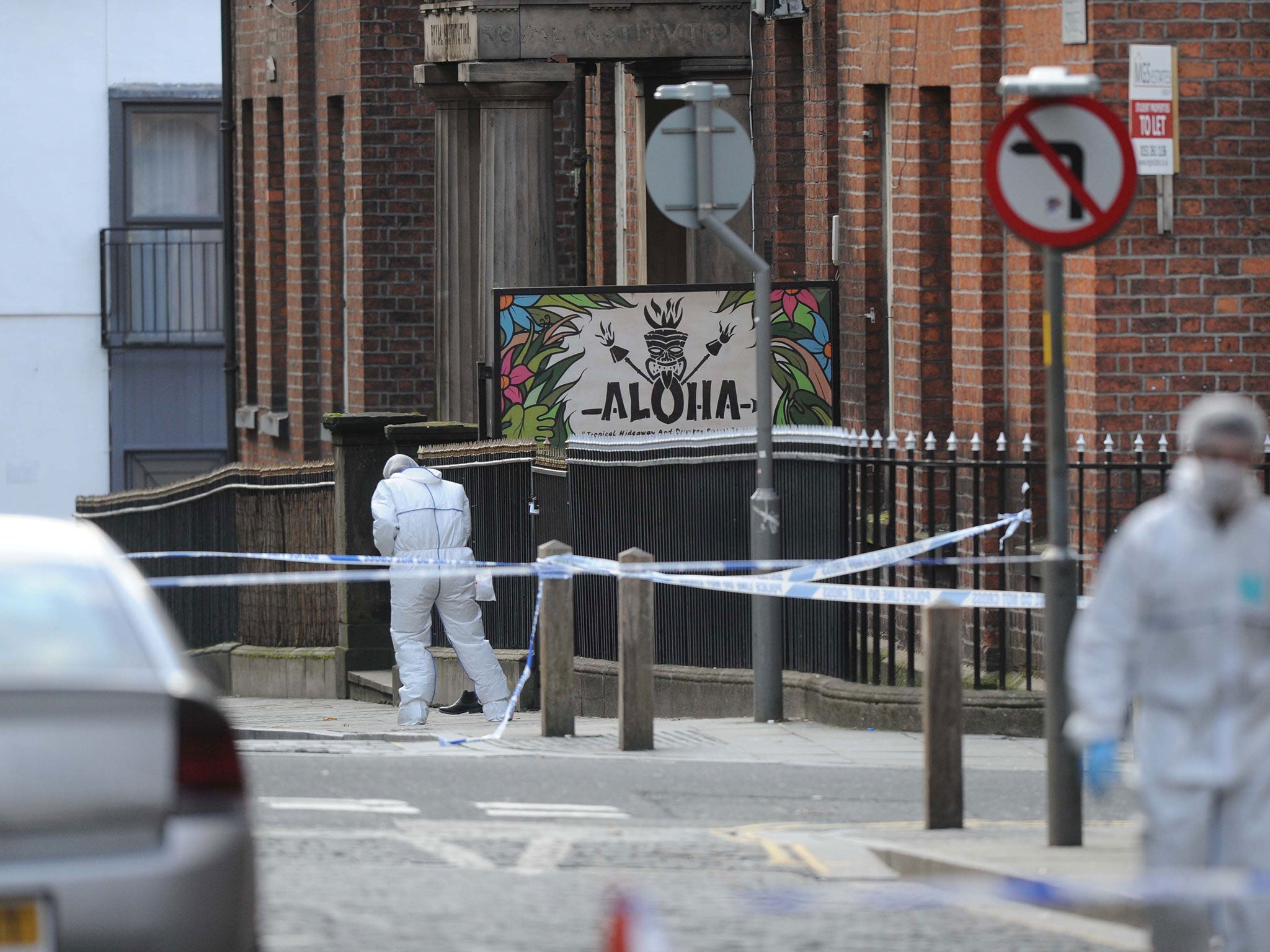 Police officers at the scene on Colquitt Street, Liverpool