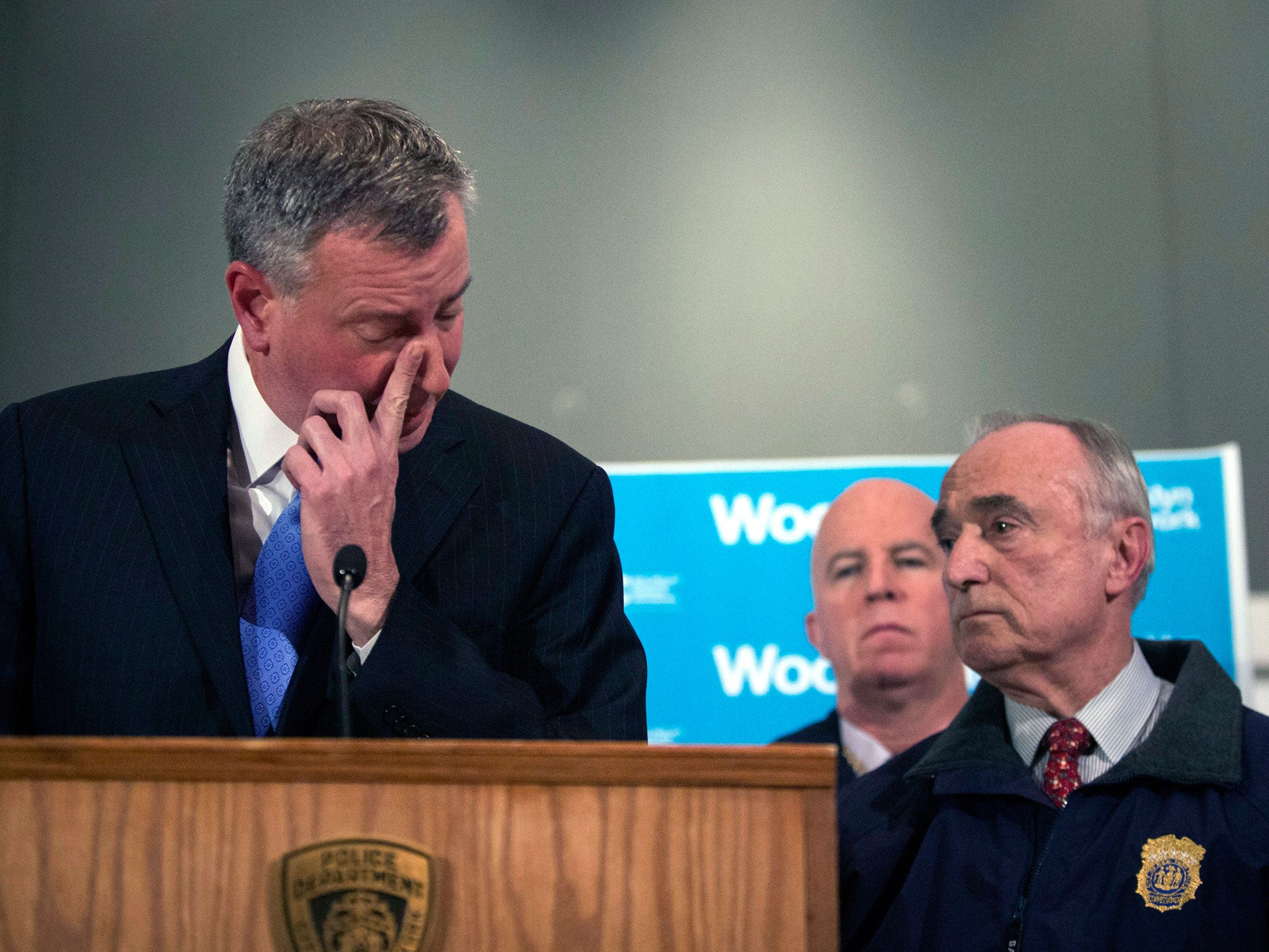 New York mayor Bill de Blasio reacts during the police press conference