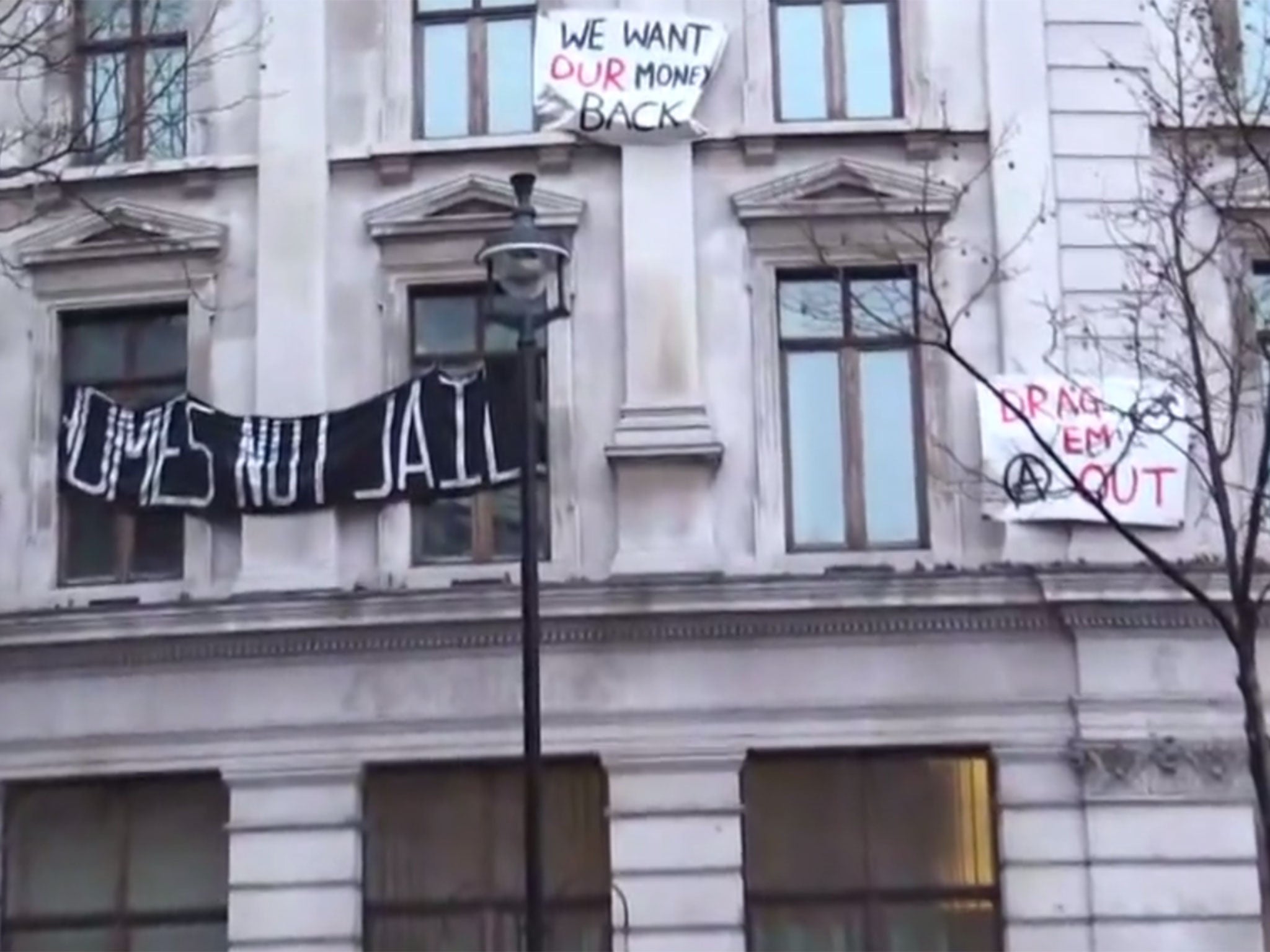 Squatting protesters take over former RBS office.